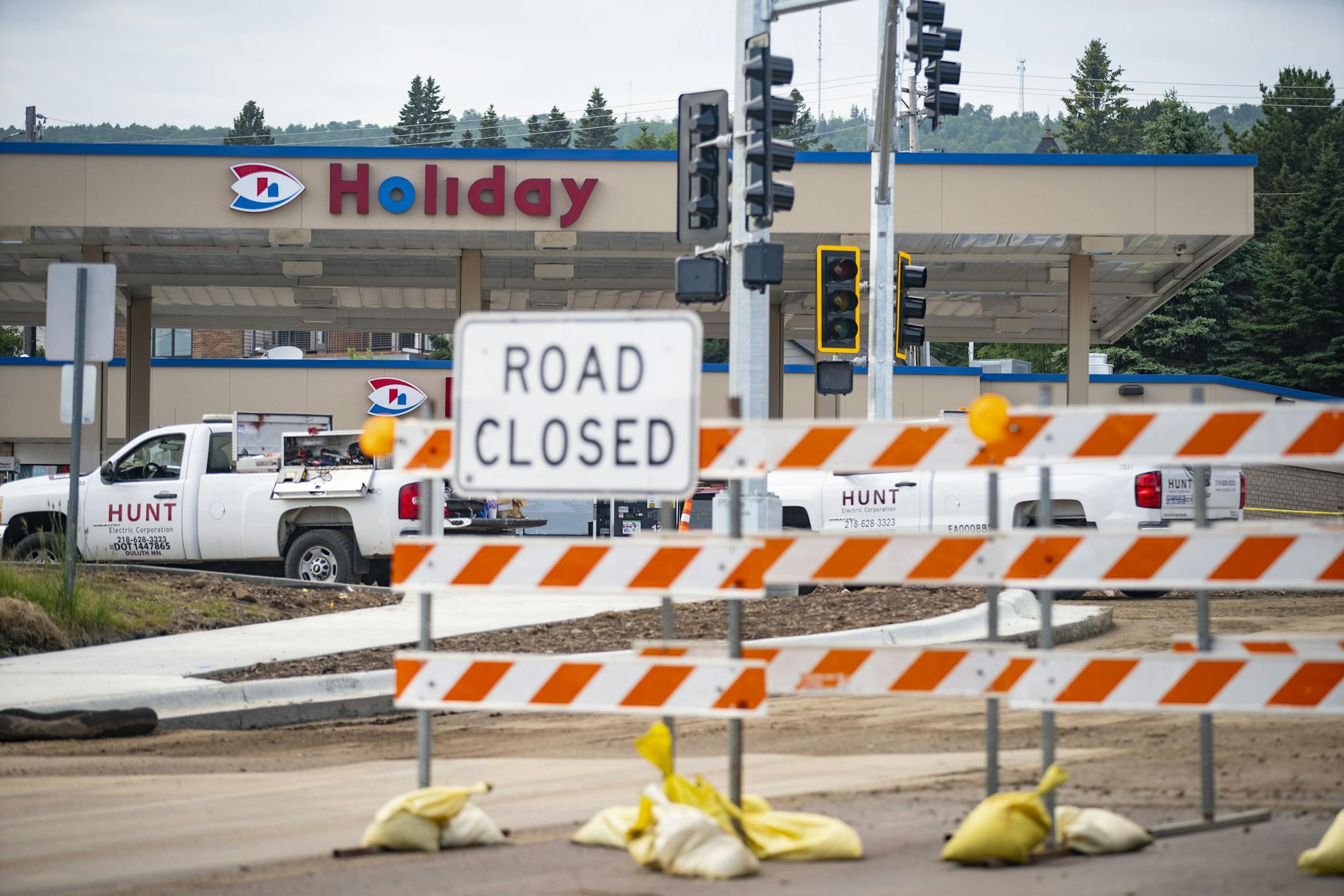 Road construction on Highway 61 in Grand Marais sparked a legal battle between the state and the town's Holiday gas station on who owns the land where their long standing sign once stood. ] ALEX KORMANN • alex.kormann@startribune.com A Holiday gas station in Grand Marais is in a legal battle with the state over its longstanding sign along Hwy. 61.