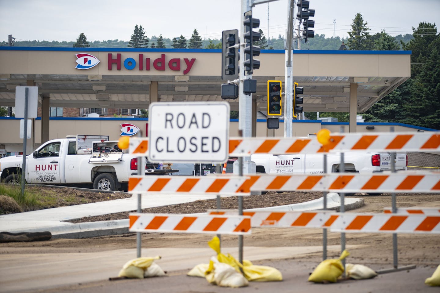 Road construction on Highway 61 in Grand Marais sparked a legal battle between the state and the town's Holiday gas station on who owns the land where their long standing sign once stood. ] ALEX KORMANN • alex.kormann@startribune.com A Holiday gas station in Grand Marais is in a legal battle with the state over its longstanding sign along Hwy. 61.