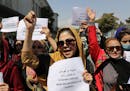 Women gather to demand their rights under the Taliban rule during a protest in Kabul, Afghanistan, Sept. 3. As the world watches intently for clues on