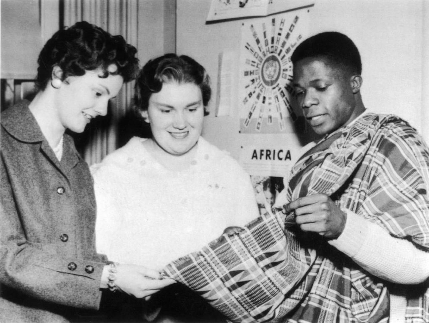 The United Nations and its Secretary-General Kofi Annan won the 2001 Nobel Peace Prize. Annan (seen here at right) shows fellow students the fabric of his African tunic, during his student days at Macalester College in St. Paul. Annan, from Ghana, graduated from Macalester in 1961.