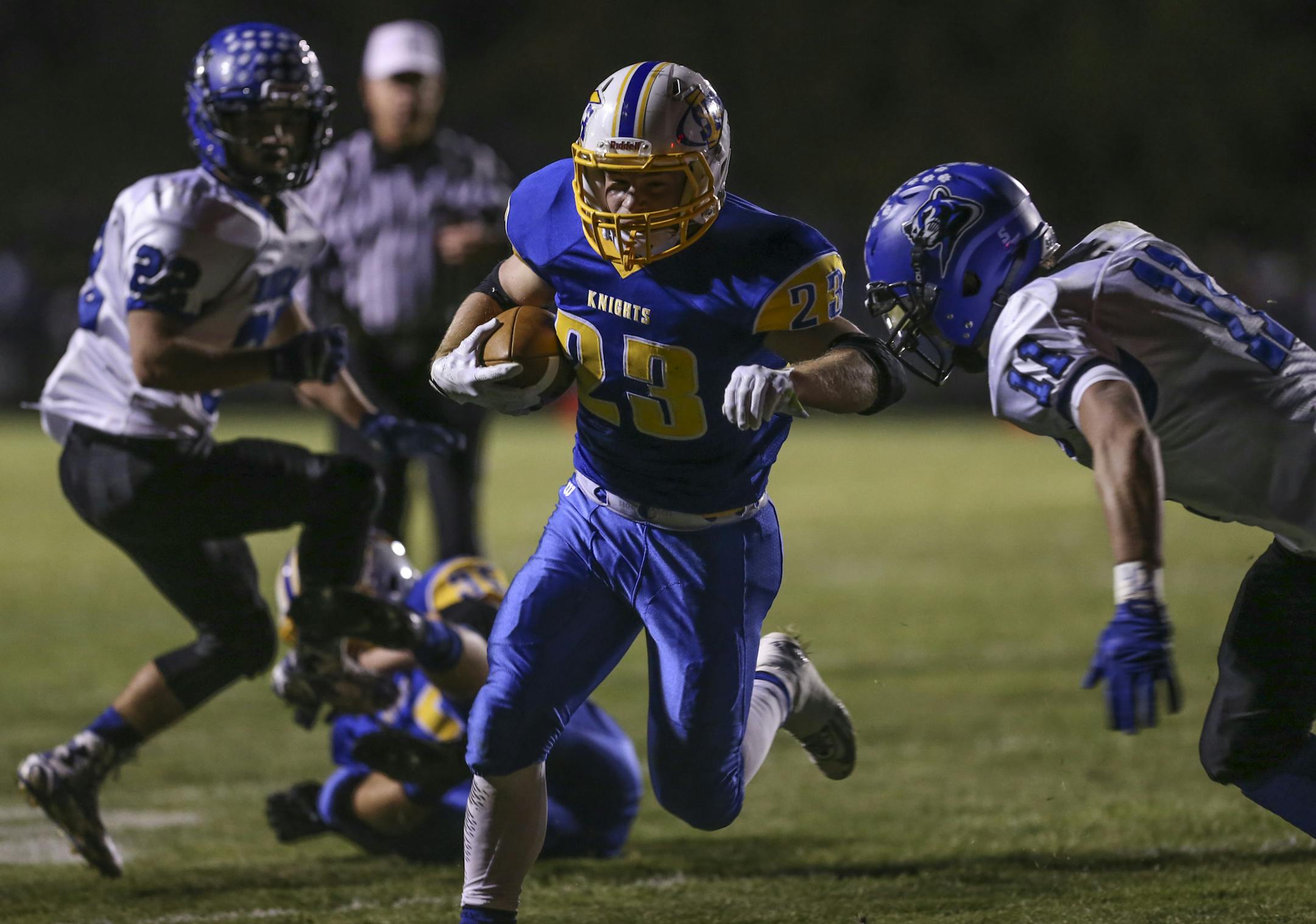 St. Michael-Albertville's #23 Jordan Joseph ran for a touchdown in the first quarter during a prep football game between Rogers and St. Michael-Albertville on Wednesday, October 15, 2014 in Albertville , Minn. ] RENEE JONES SCHNEIDER &#x2022; reneejones@startribune.com