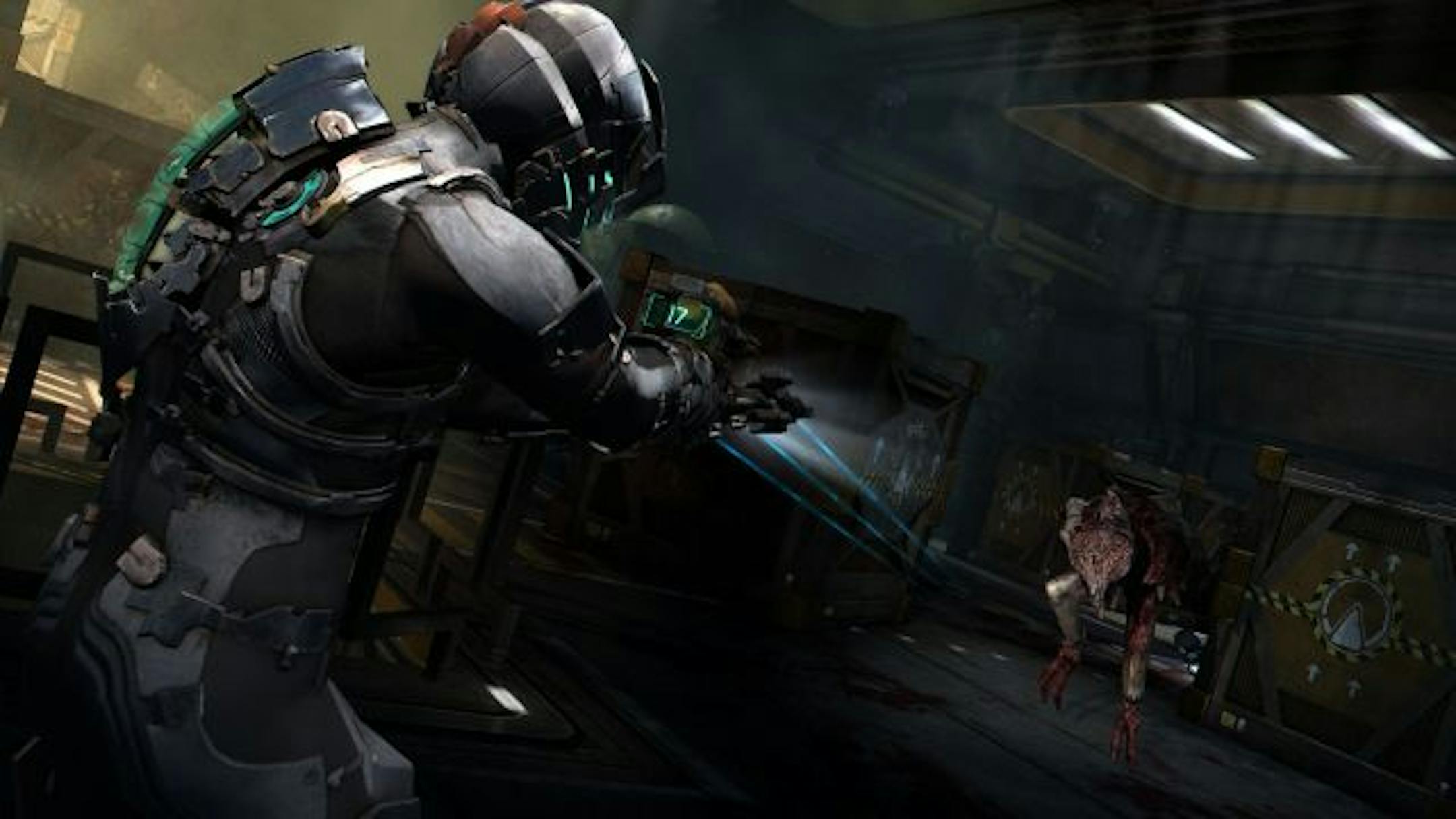 Isaac Clarke fires at a necromorph in "Dead Space 2."