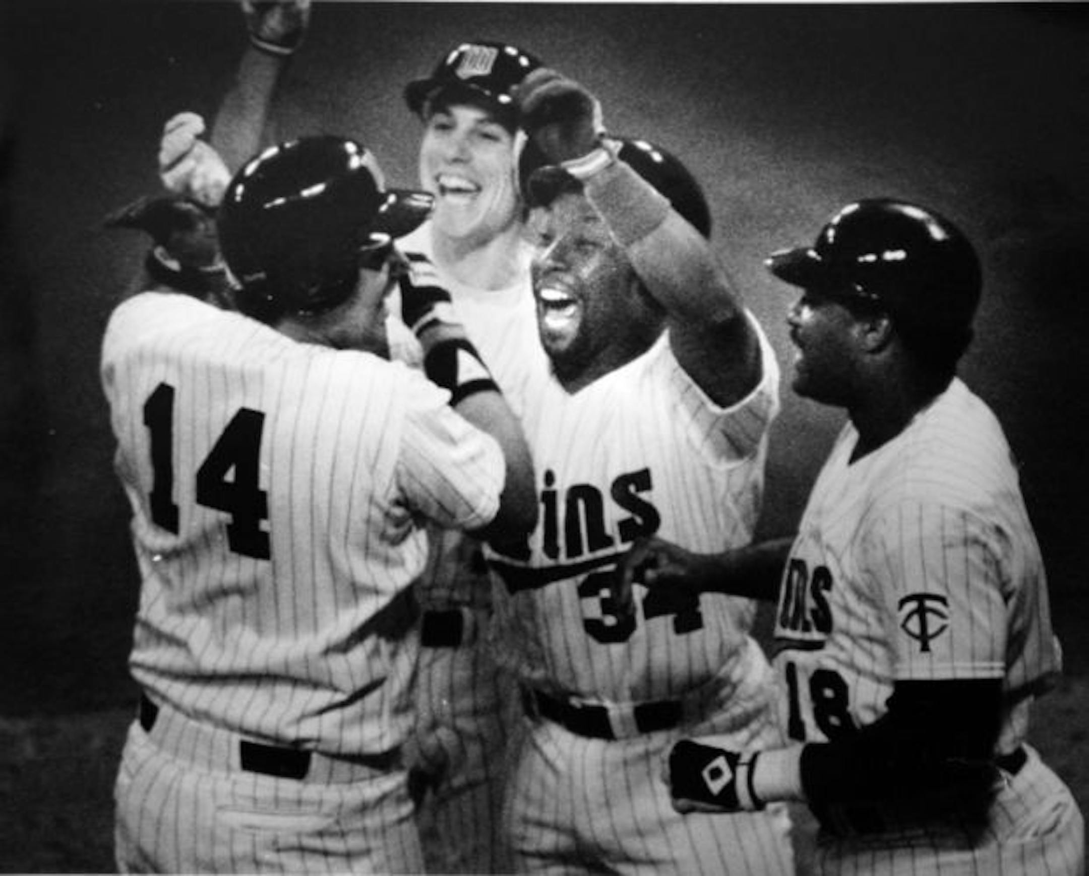 Kent Hrbek's grand slam was a hit with Greg Gagne, Kirby Puckett, who had a fine day himself, and Don Baylor, who wasn't a slouch, either.
