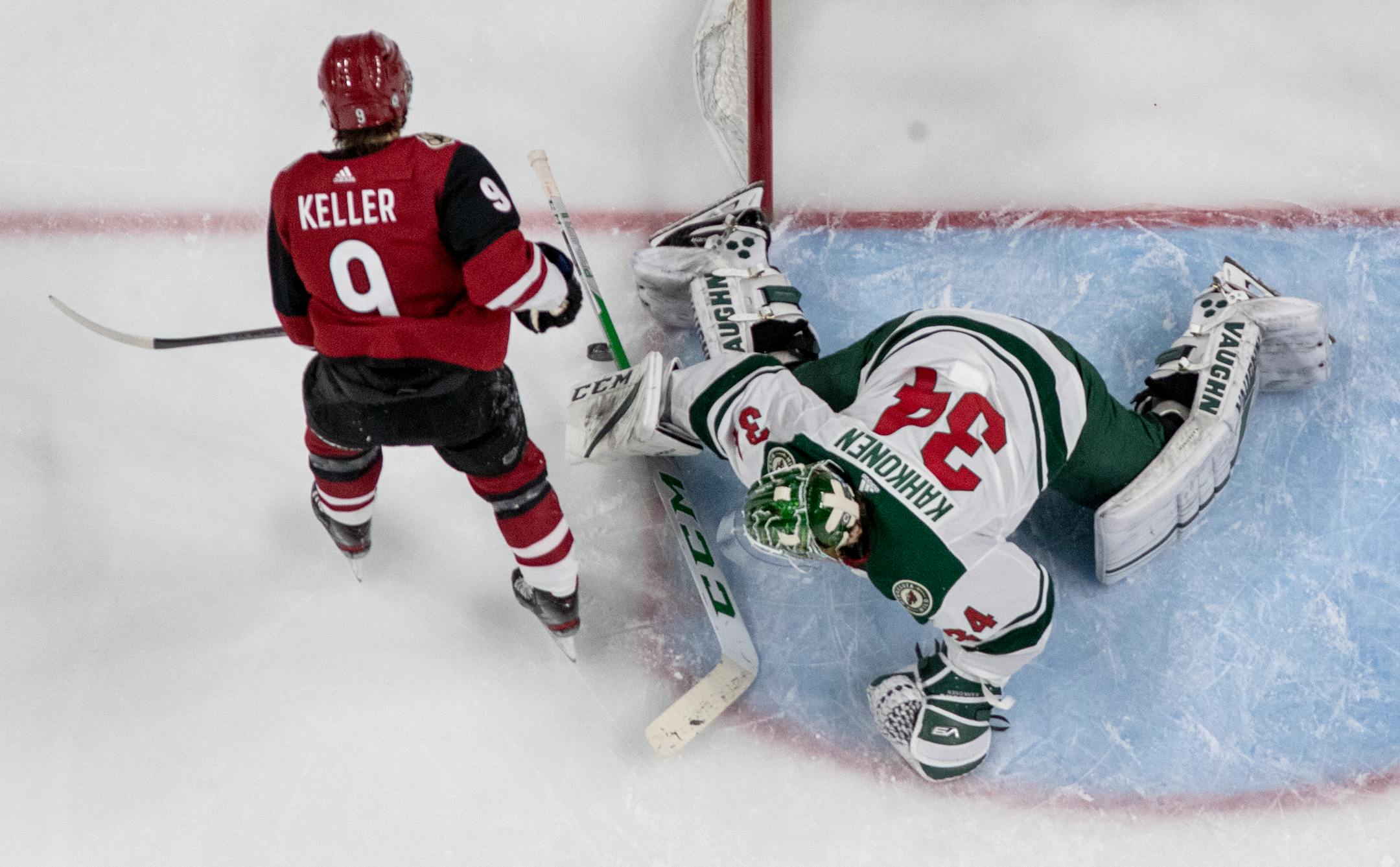 Minnesota Wild goalie Kaapo Kahkonen (34) made save on a shot by Clayton Keller (9) of the Arizona Coyotes in the second period.