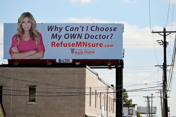 A billboard near the main entrance of the Minnesota State Fairgrounds in St. Paul, Minn., on Friday, August 9, 2013.