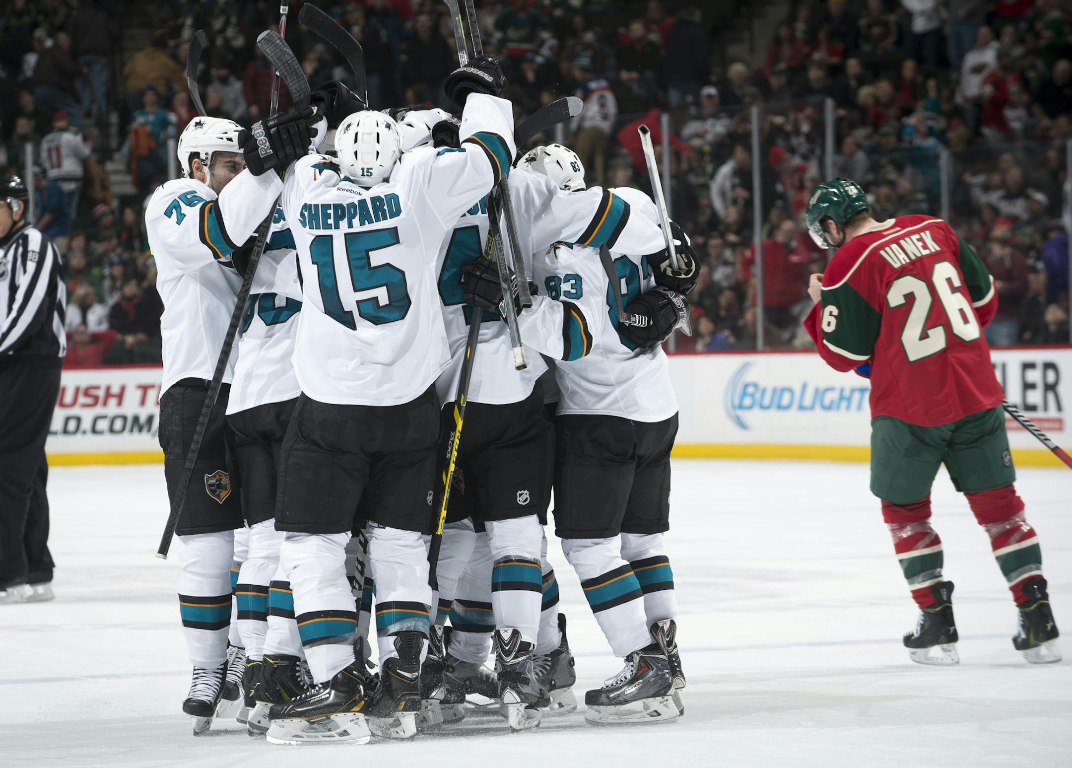 Minnesota Wild left wing Thomas Vanek (26) skates off the ice as the San Jose Sharks celebrate an overtime win on Tuesday night. ] (Aaron Lavinsky | StarTribune) The Minnesota Wild take on the San Jose Sharks Tuesday, Jan. 6, 2014 at Xcel Energy Center in St. Paul.