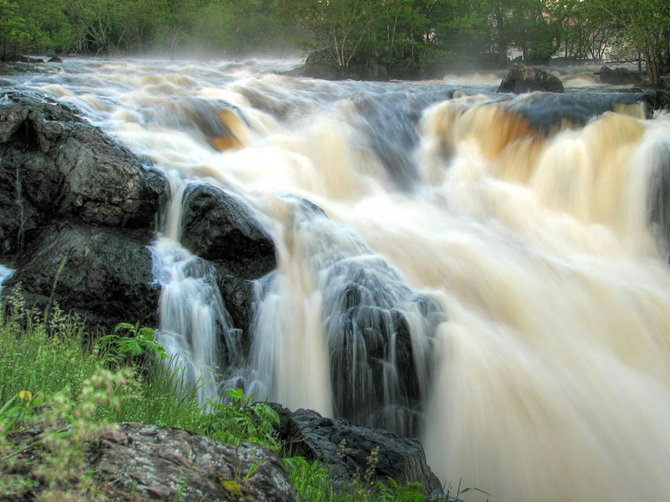 Photographer: Dennis Hensche of Minnetonka. The scene: Hensche was traveling with other photographers in June 2008 when he captured this dramatic image of Kawishiwi Falls near Ely, Minn. The trip was the first of several Road Scholar photography trips, run by the nonprofit Elderhostel, that he has taken. He is particularly struck by how the rushing water contrasts with the black rocks of the falls, which have a 70-foot drop.