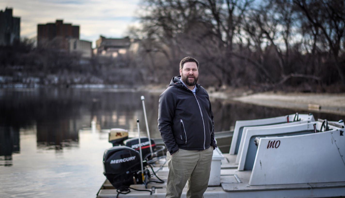 University of Minnesota men's rowing coach Aaron Schnell received a citizen's award from university police for helping in the rescue of a man who fell from the Washington Avenue Bridge in July.