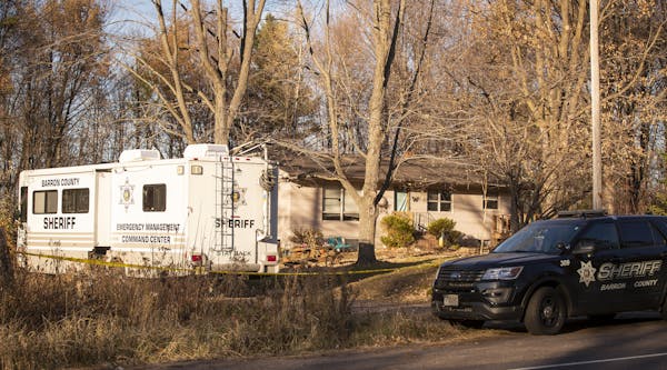 The home of James and Denise Closs in Barron, Wis. is seen with Barron County Sheriff vehicles parked outside. ] LEILA NAVIDI &#x2022; leila.navidi@st