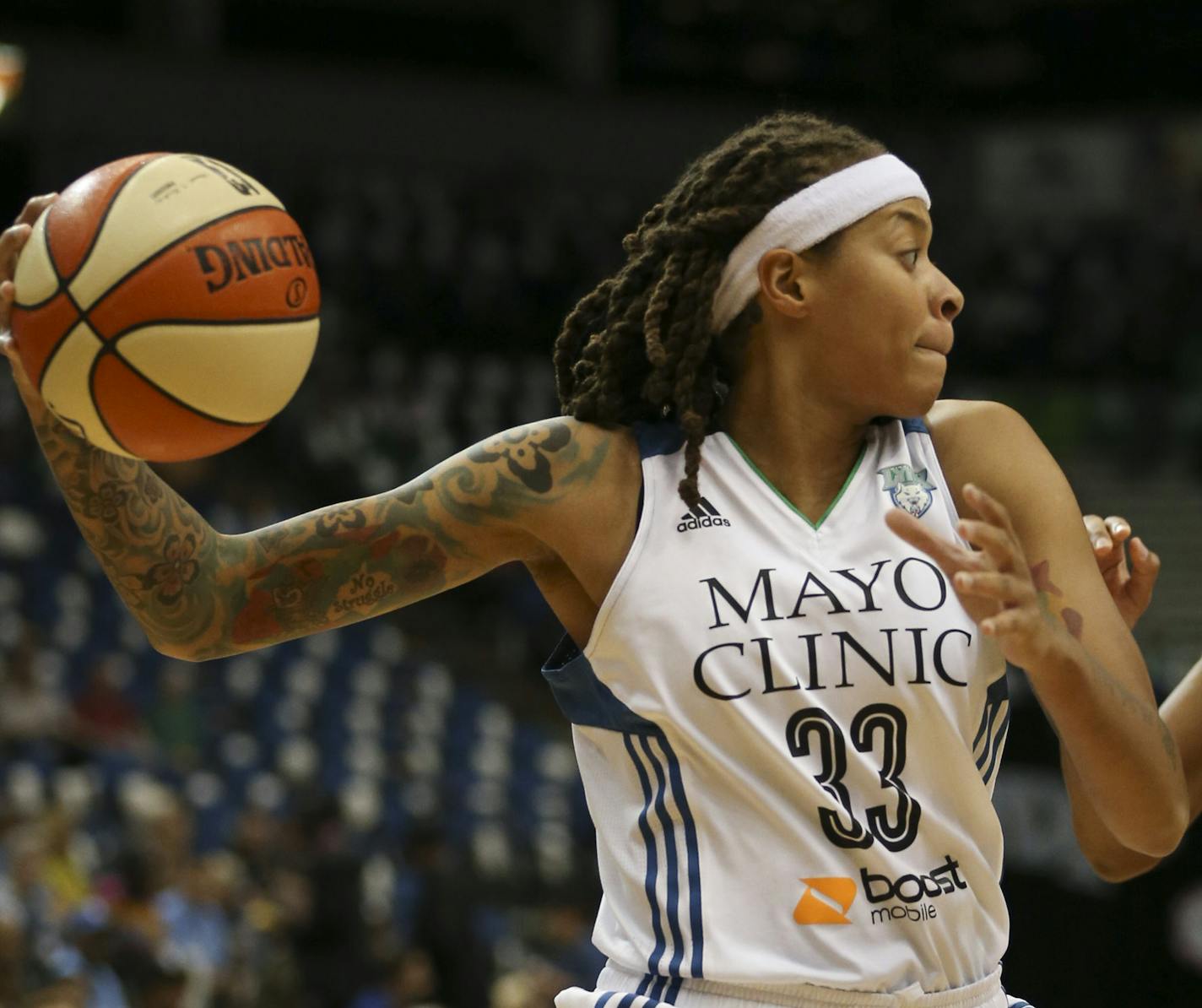 Lynx guard Seimone Augustus (33) looked for a teammate to pass to in the first quarter while defended by Phoenix Mercury forward Monique Currie (25) Thursday night at Target Center. ] JEFF WHEELER &#xef; jeff.wheeler@startribune.com The Minnesota Lynx began their Western Conference Final series with the Phoenix Mercury in an WNBA game Thursday night at Target Center in Minneapolis. They led 35-32 at the half.