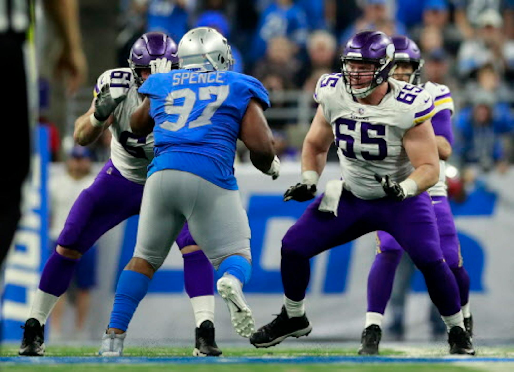 Minnesota Vikings center Pat Elflein (65) sets to block Detroit Lions defensive tackle Akeem Spence (97) during an NFL football game, Thursday, Nov. 23, 2017, in Detroit. The Vikings won the game 30-23. (Jeff Haynes/AP Images for Panini)