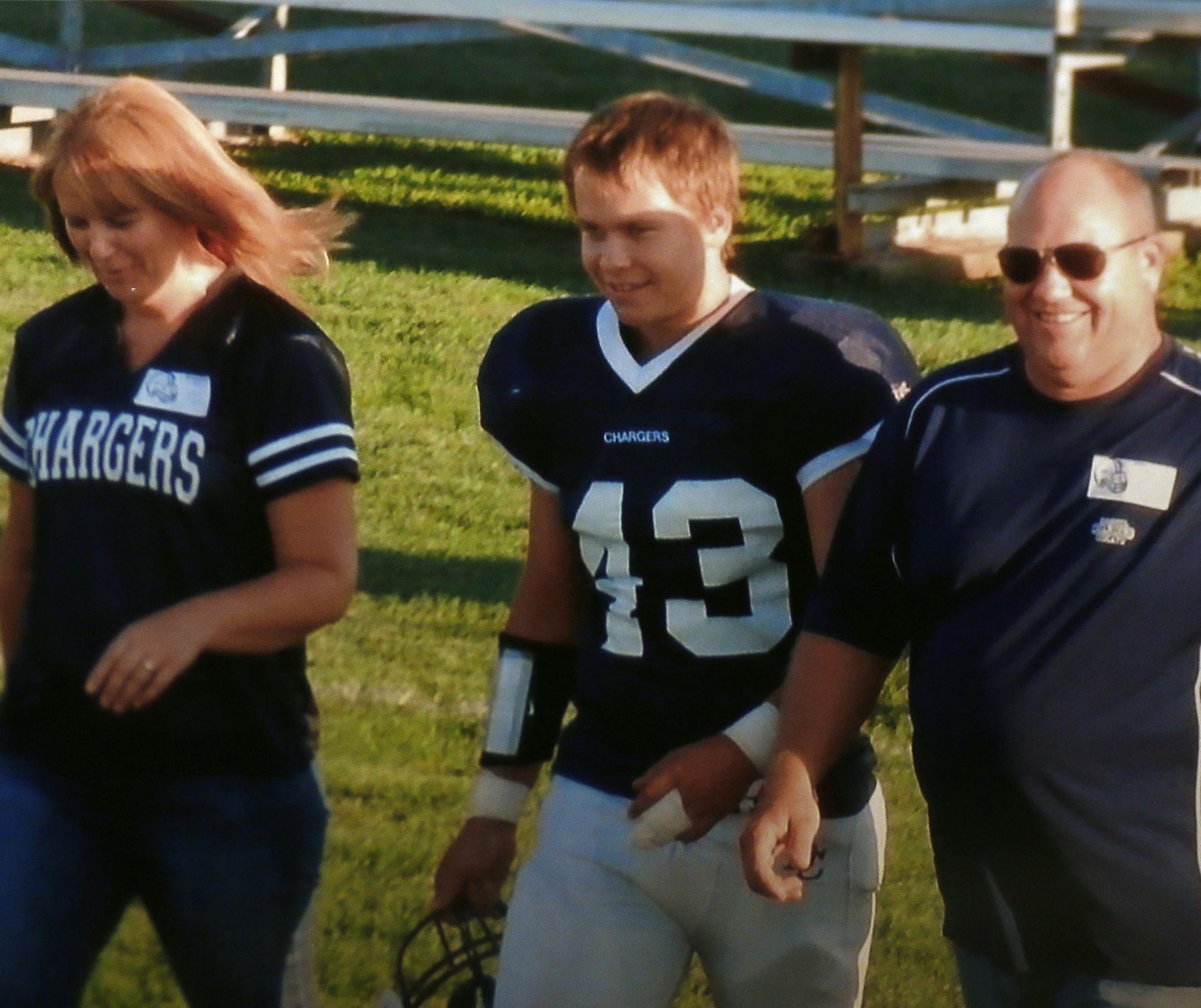 Family photo of Luke Nelson with his parents Sara and Greg.Wednesday November 6, 2013 in Dassel , MN. ] JERRY HOLT &#x201a;&#xc4;&#xa2; jerry.holt@startribune.com