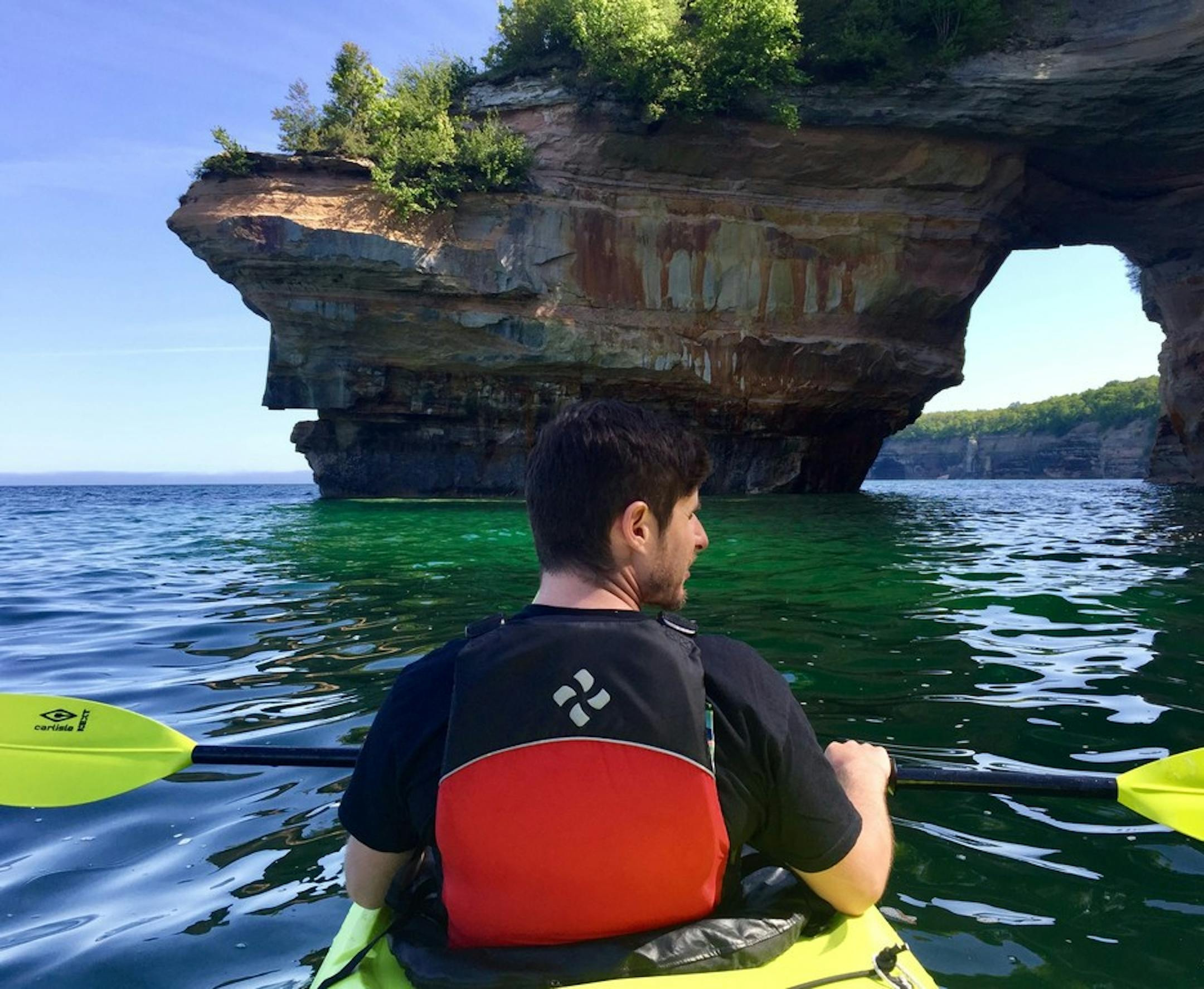 Kayakers paddle along Pictured Rocks National Lakeshore in Michigan, along the south shore of Lake Superior -- one of the highlights along the 1,300-mile Lake Superior Circle Tour.