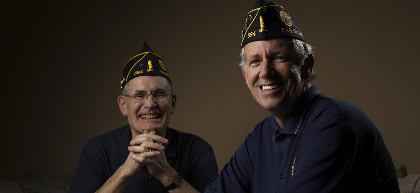 John Flynn, Commander of Eagan's American Legion Post 594, foreground, with Adjutant Wayne Beierman. ] JEFF WHEELER &#x2022; jeff.wheeler@startribune.com John Flynn, Commander of Eagan's American Legion Post 594, has seen the post's membership skyrocket from 77 to more than 180 in just eight months, even though the post doesn't have a permanent home. He was photographed in the basement of his Eagan home with Adjutant Wayne Beierman Tuesday night, Februray 21, 2017.