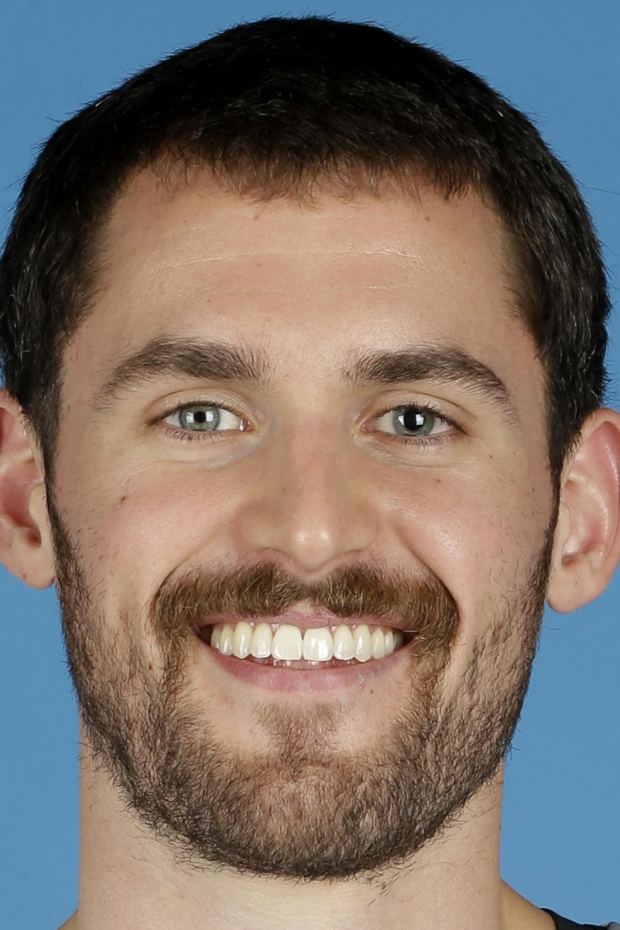 Minnesota Timberwolves' Kevin Love poses for the NBA basketball team's media day, Monday, Sept. 30, 2013, in Minneapolis. (AP Photo/Jim Mone) ORG XMIT: MP10