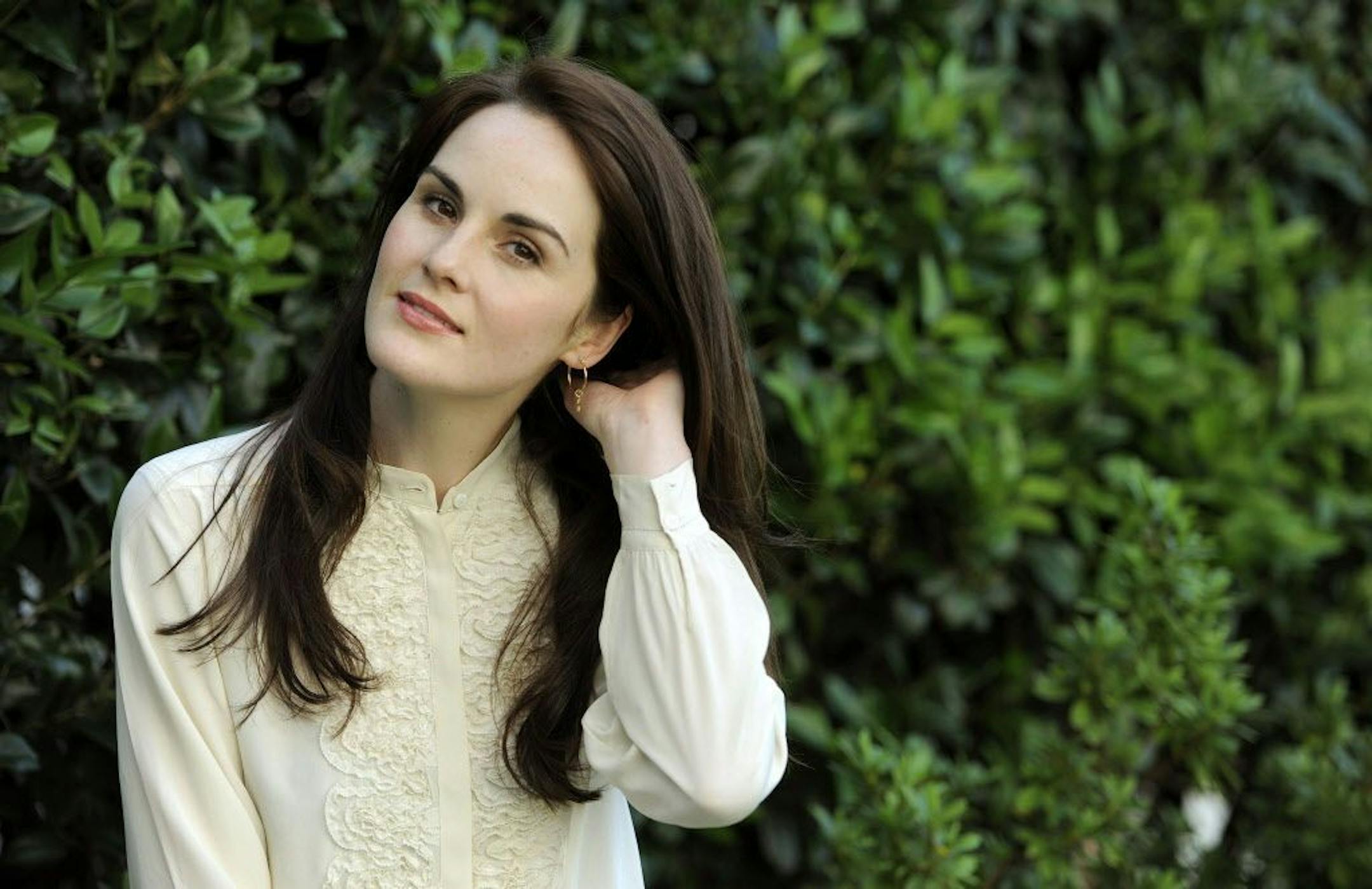 FILE - This is a July 31, 2011 photo of actress Michelle Dockery poses for a portrait in Beverly Hills, Calif. Dockery stars in the TV series "Downton Abbey." Downton star Dockery is swapping one aristocratic world for another in a new production of "Les Liaisons Dangereuses." Dockery is scheduled to appear alongside Dominic West and Janet McTeer in Christopher Hampton's play about nobles fighting a battle of sexual wiles in 18th-century France.