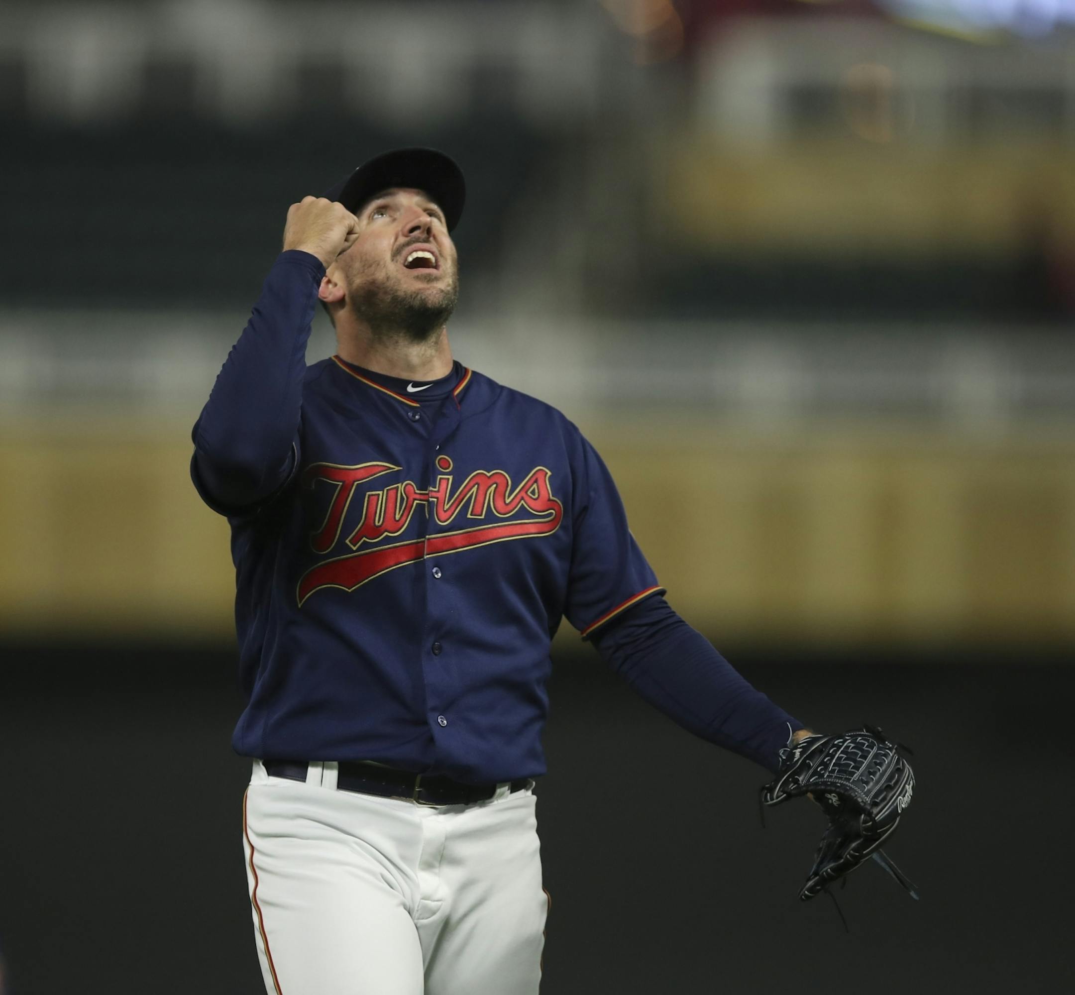 Minnesota Twins closer Blake Parker celebrated after striking out the Toronto Blue Jays' Brandon Drury to end the game.