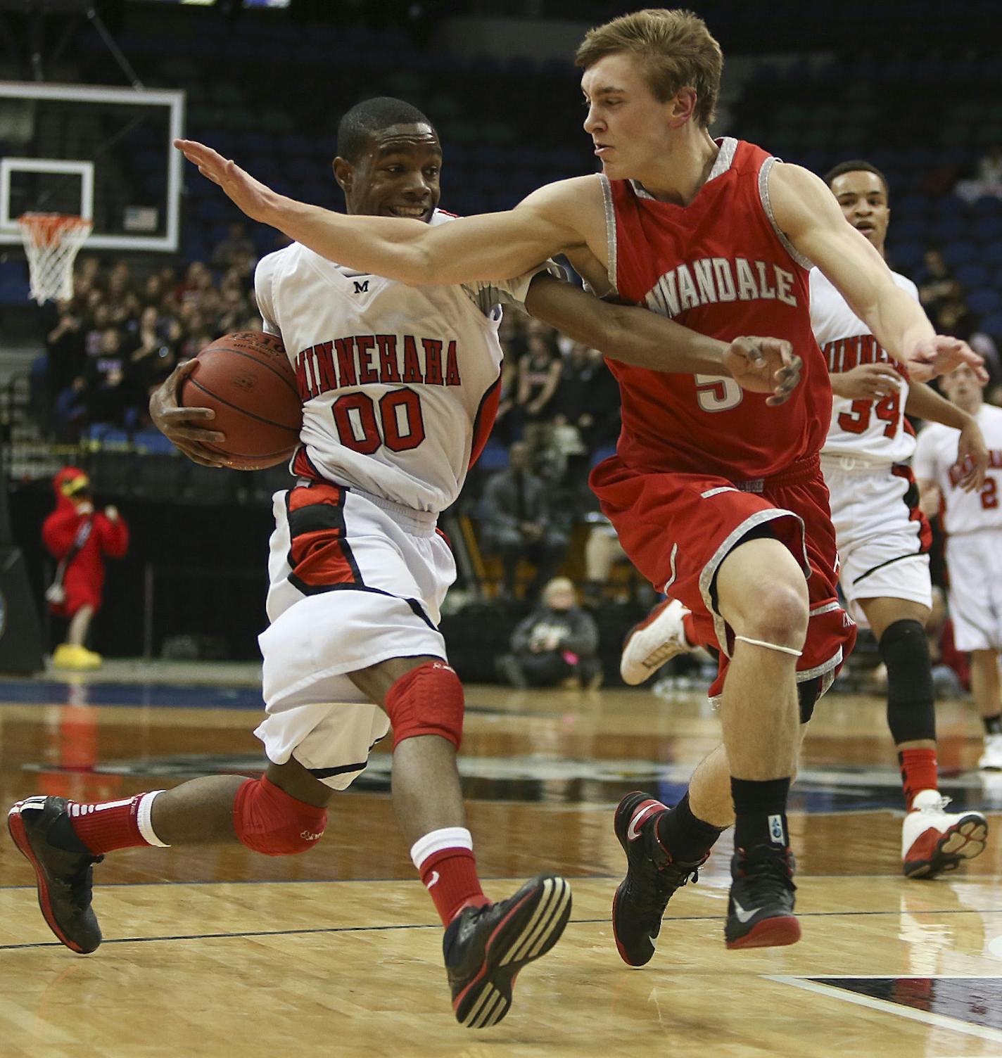 Minnehaha's Marcellous Hazzard fought to get to the basket with Annadale's Matt Miller defedning during the first half of the Class 2A semifinals at the Target Center in Minneapolis, Min., Friday, March 22, 2013. ] (KYNDELL HARKNESS/STAR TRIBUNE) kyndell.harkness@startribune.com