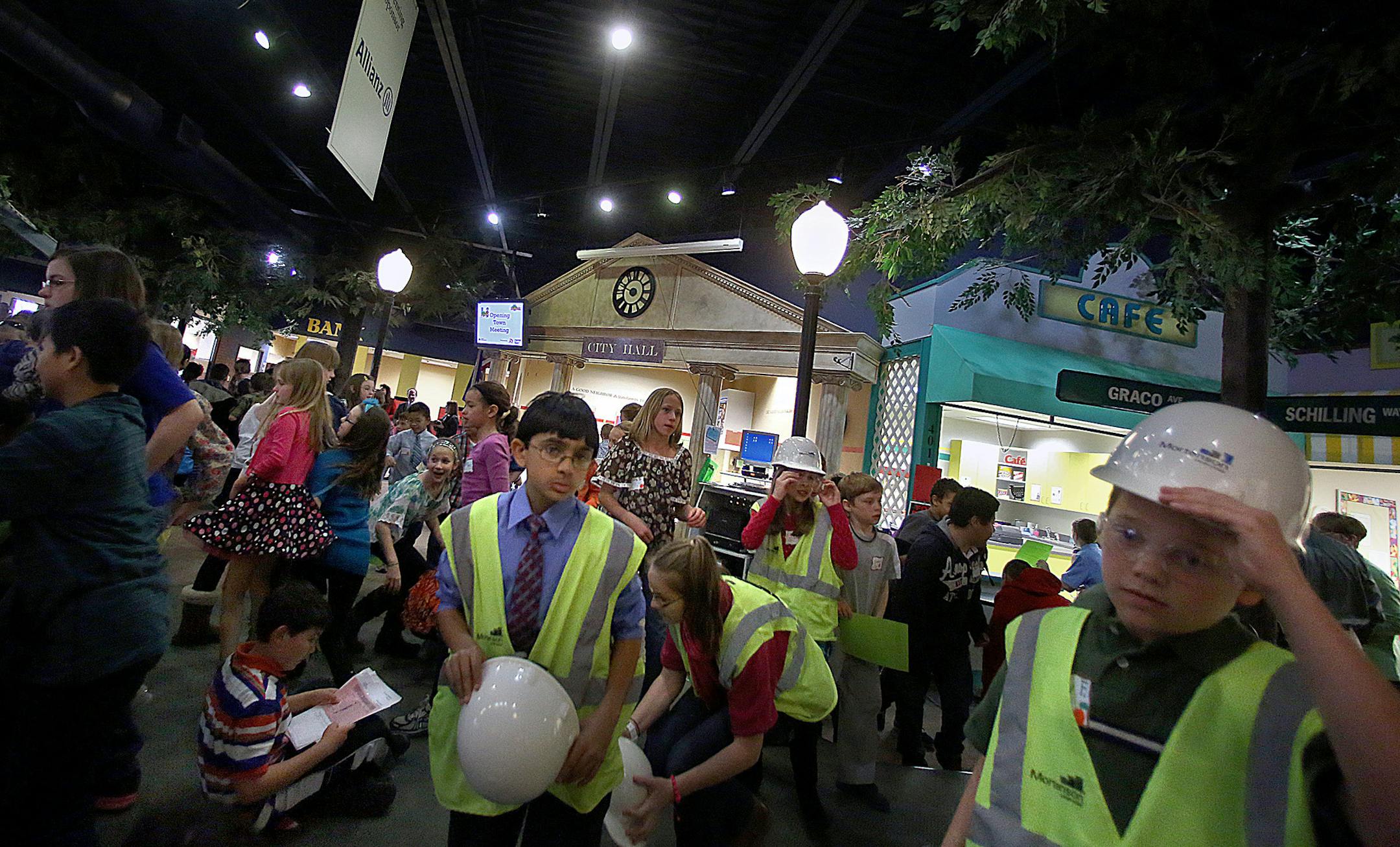 After receiving instructions, students headed out to their assigned jobs for the day.] (JIM GEHRZ/STAR TRIBUNE) / April 2, 2013 / 11:00 AM Maplewood, MN ‚Äì BACKGROUND INFORMATION- Fourth and 5th grade Students from Greenleaf and Westview Elementary schools in the Rosemount-Apple Valley-Eagan School District spent a day recently learning how to run a business in a program put on by Junior Achievement. Students learned how to do payroll and taxes and pay utilities in a simulated