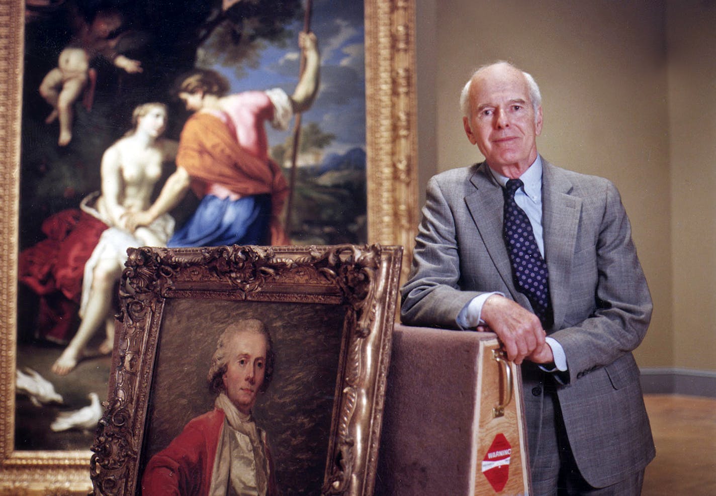 Bruce Dayton, longtime Twin Cities and Minnesota philanthropist, has been (at least at time of this photo in 1992) a trustee and benefactor of the Minneapolis Institute of Arts for about fifty years. Among an exhibition at the MIA of works from his collection are "Self Portrait" (about 1786) by Jean-Laurent Mosnier (smaller one in foreground), and "Venus and Adonis" (about 1650) by Nicolas Mignard. Star Tribune staff photo May 5, 1992, by Tom Sweeney. ORG XMIT: MIN2014121117105564 ORG XMIT: MIN1