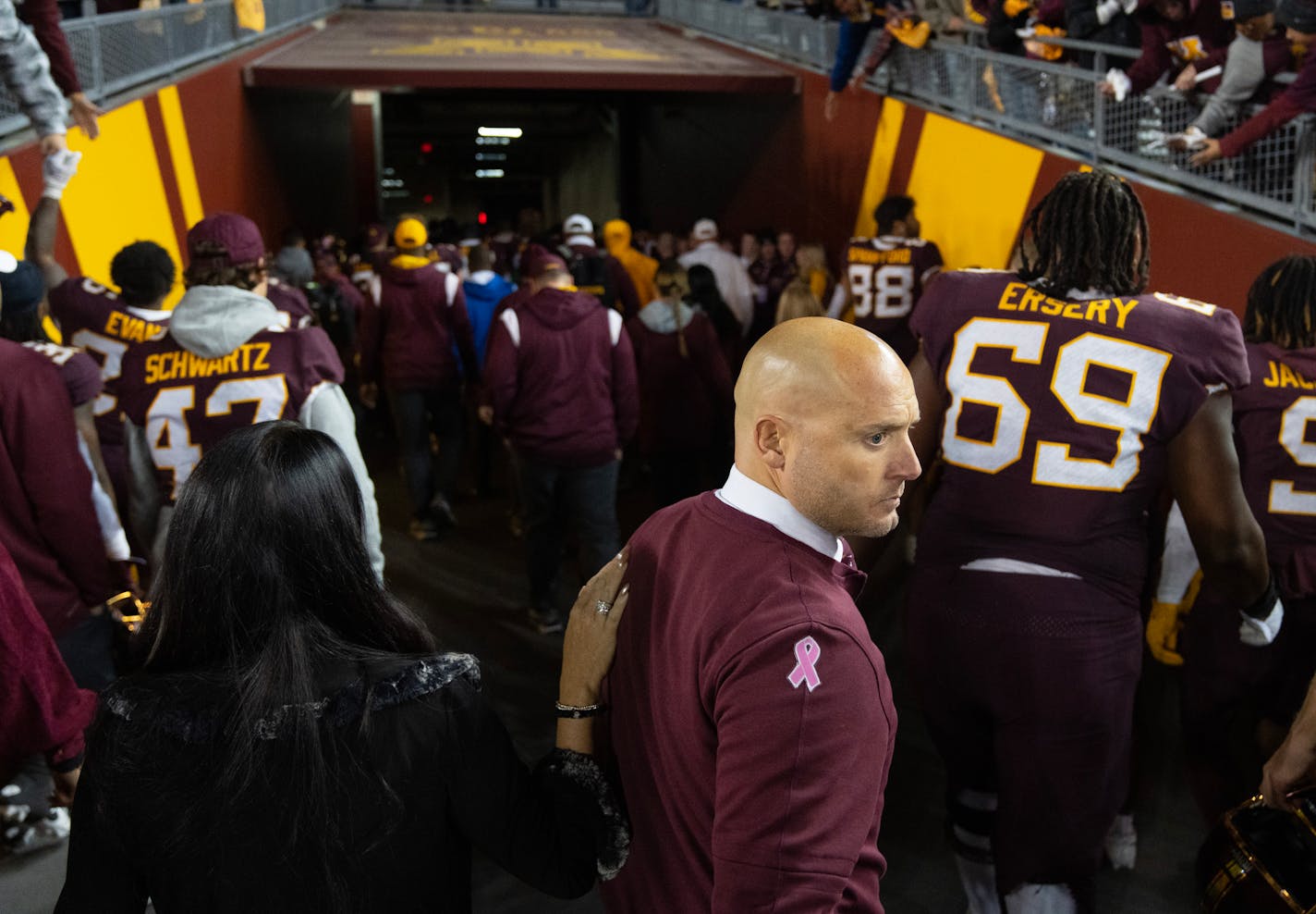 Minnesota head coach P.J. Fleck walks into the tunnel behind his team after losing 52-10 to Michigan Saturday, Oct. 07, 2023, at Huntington Bank Stadium in Minneapolis, Minn. ]