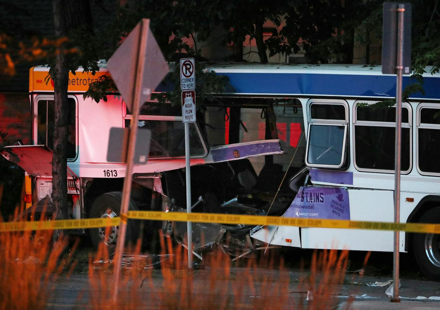 A damaged Metro Transit bus could be seen as police investigated the scene. ] ANTHONY SOUFFLE &#xd4; anthony.souffle@startribune.com Police investigated the scene of a fatal collision between a car and bus Friday, July 21, 2017 near the intersection of Dale Street North and Charles Avenue in St. Paul, Minn. ORG XMIT: MIN1707212212434690