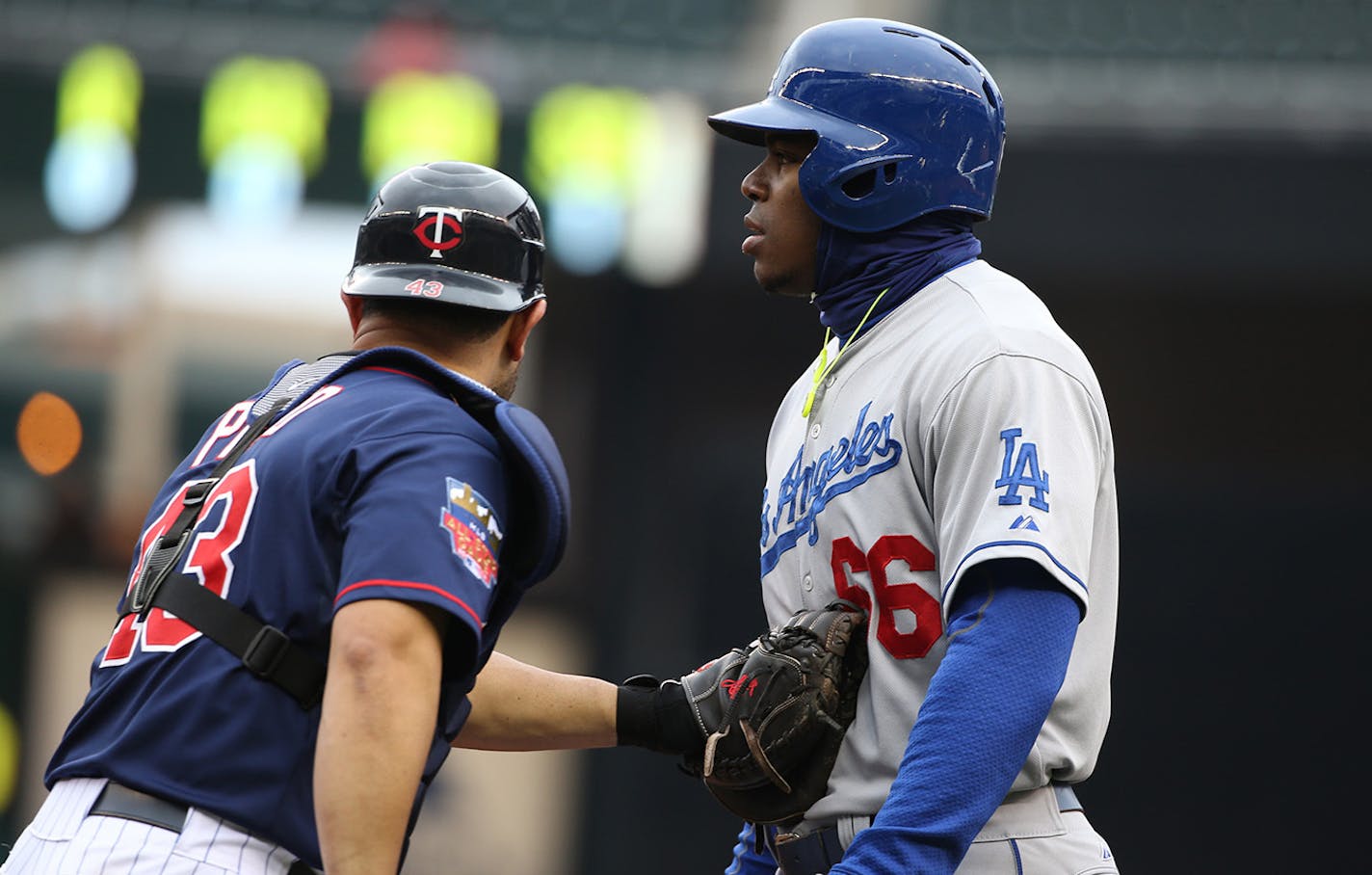 Twins catcher Josmil Pinto tagged out Dodgers Yasiel Puig in the first inning. ] (KYNDELL HARKNESS/STAR TRIBUNE) kyndell.harkness@startribune.com Twins vs Dodgers at Target Field in Minneapolis, Min., Thursday, May 12014.