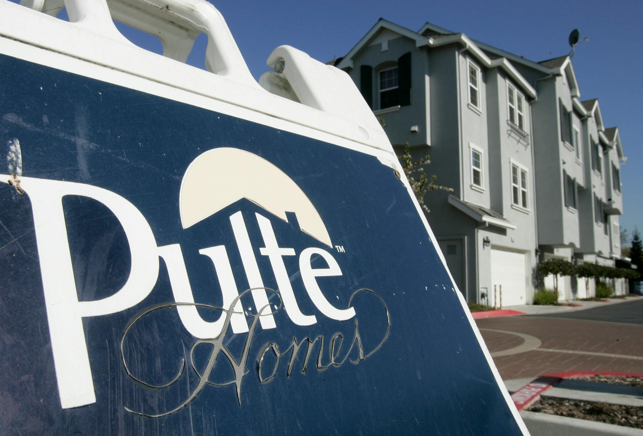 FILE - In this Feb. 3, 2009 file photo, a Pulte Homes sign is shown at a Pulte Homes complex in Sunnyvale, Calif. (AP Photo/Paul Sakuma, file)