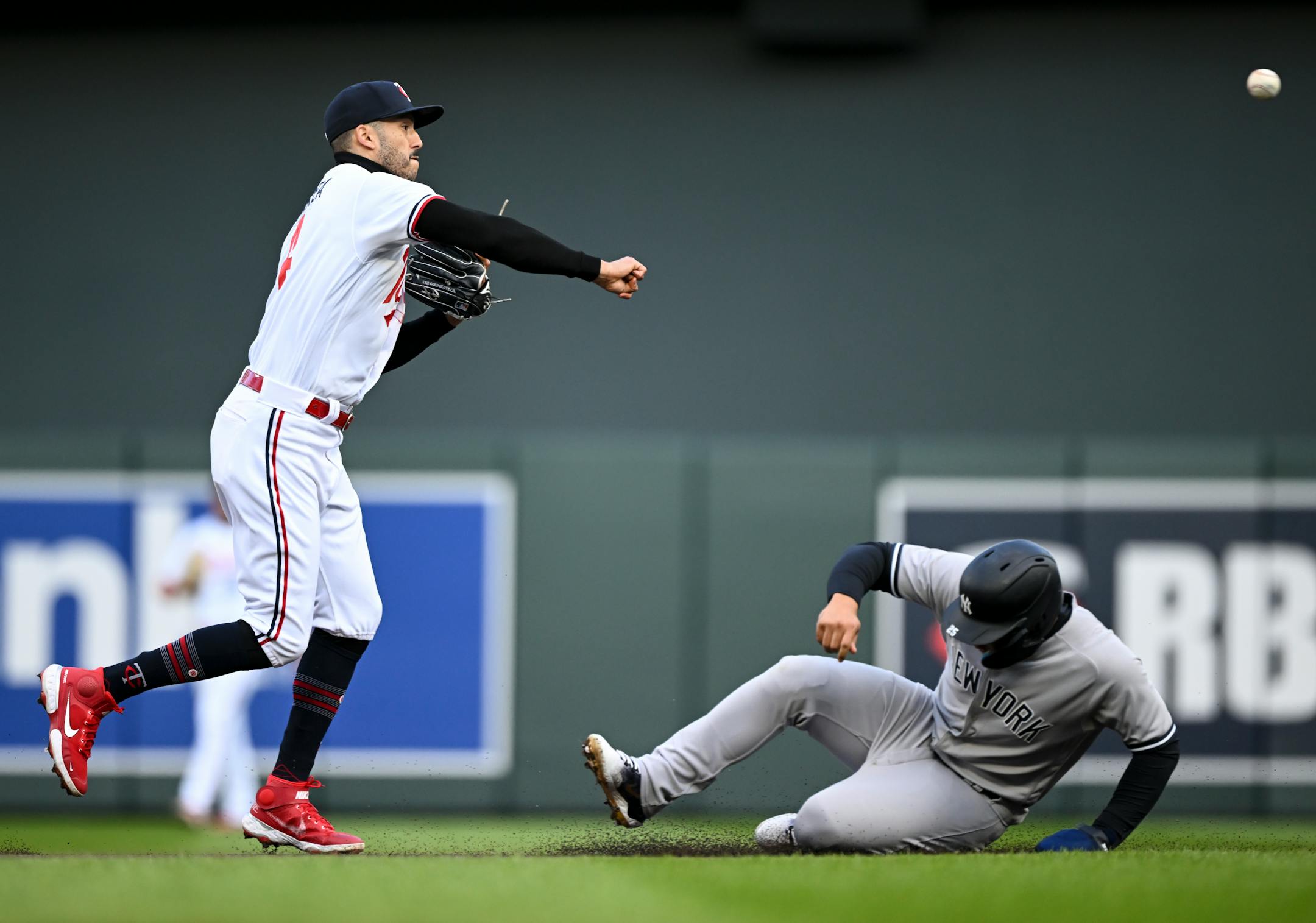 New York Yankees second baseman Gleyber Torres is forced out at second as Minnesota Twins shortstop Carlos Correa turns a double play off a hit by third baseman DJ LeMahieu in the top of the second inning Monday night.