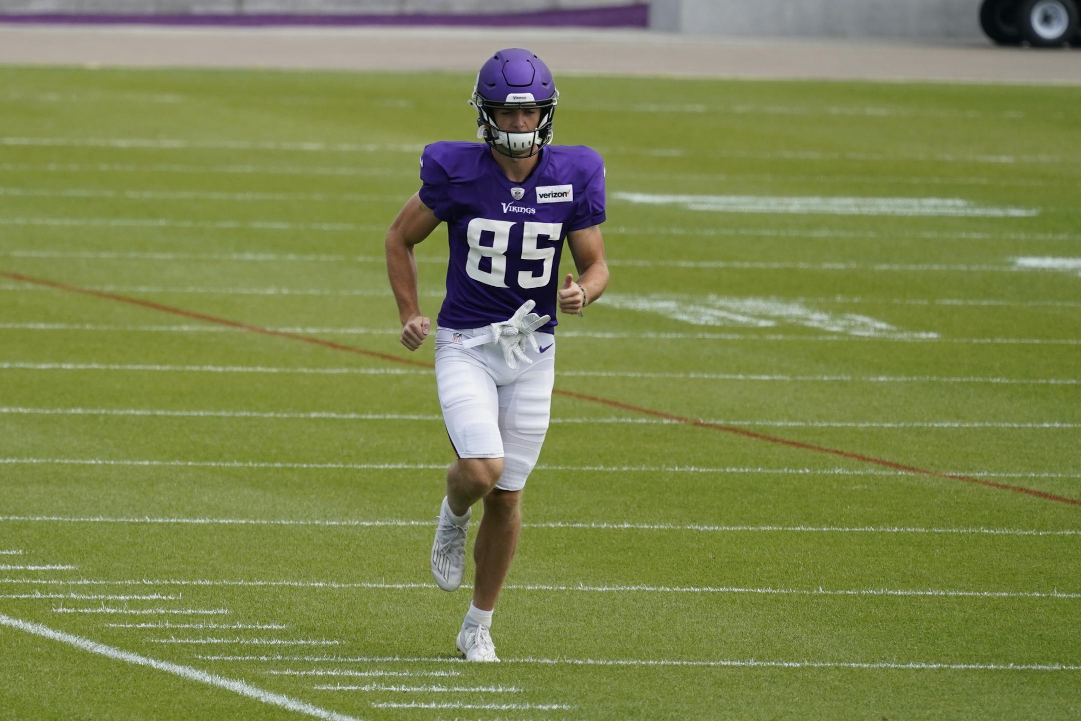 FILE - Minnesota Vikings wide receiver Dan Chisena (85) jogs during the NFL football team's training camp Monday Aug. 24, 2020, in Eagan, Minn. The Minnesota Vikings kept one undrafted rookie on their initial regular season roster, Dan Chisena, a former track star at Penn State who gave up his scholarship to walk on for the football team and showed enough special teams ability for the Vikings to keep him. (AP Photo/Jim Mone, File)