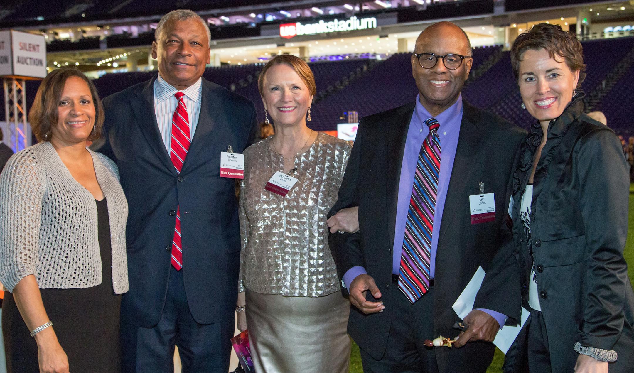 Dawn and Walter Chesley, Elizabeth and Syl Jones, Maggie Romens attend the HCMC Light Up the Night Gala at US Bank Stadium. [ Special to Star Tribune, photo by Matt Blewett, Matte B Photography, matt@mattebphoto.com, December 2, 2016, Hennepin County Medical Center Light up the Night Gala, US Bank Stadium, Minneapolis, Minnesota, SAXO 1002449430, 010117FACES