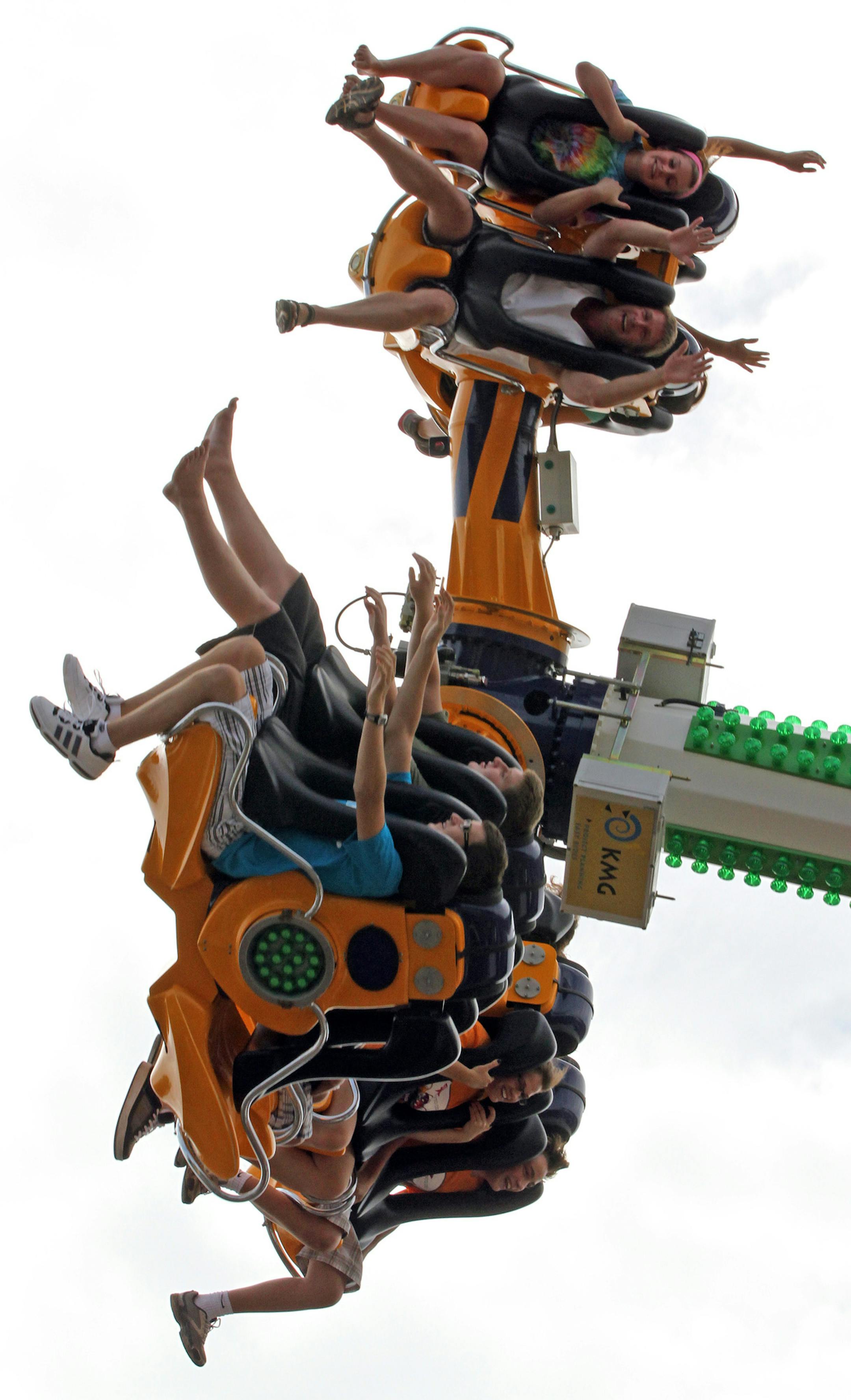 Minnesota State Fair goers got turned upside down and around as they road the Rockit ride at the midway on 8/27/2011.] Bruce Bisping/Star Tribune.