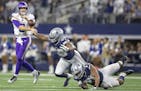 A holding call was called on the defense on Minnesota Vikings' quarterback Kirk Cousins, setting up the Cook touchdown in the third quarter. ] ELIZABE