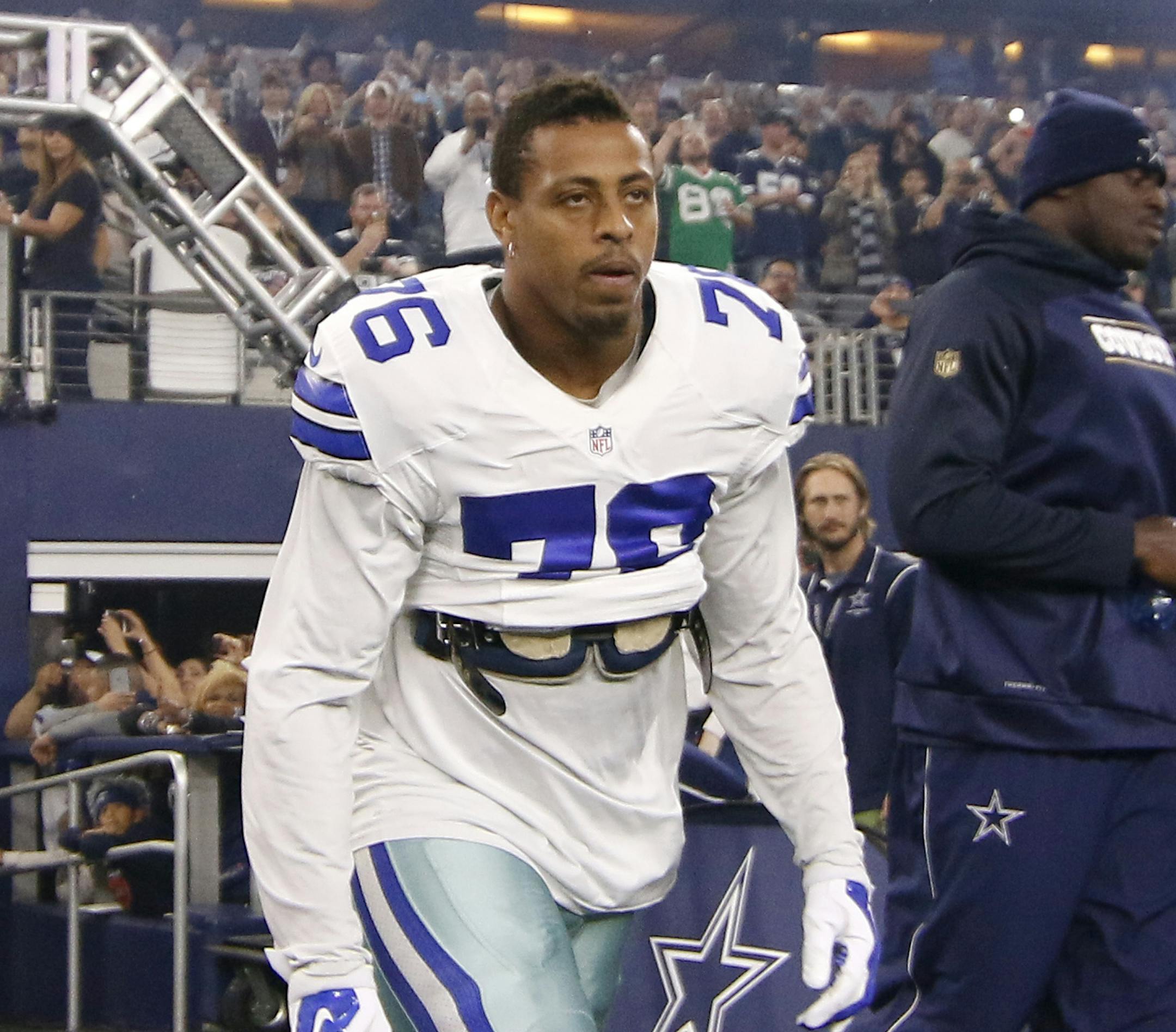 Dallas Cowboys defensive end Greg Hardy jots out onto the field with the team for an NFL football game against the New York Jets on Saturday, Dec. 19, 2015, in Arlington, Texas. (AP Photo/Roger Steinman) ORG XMIT: OTKTG123A