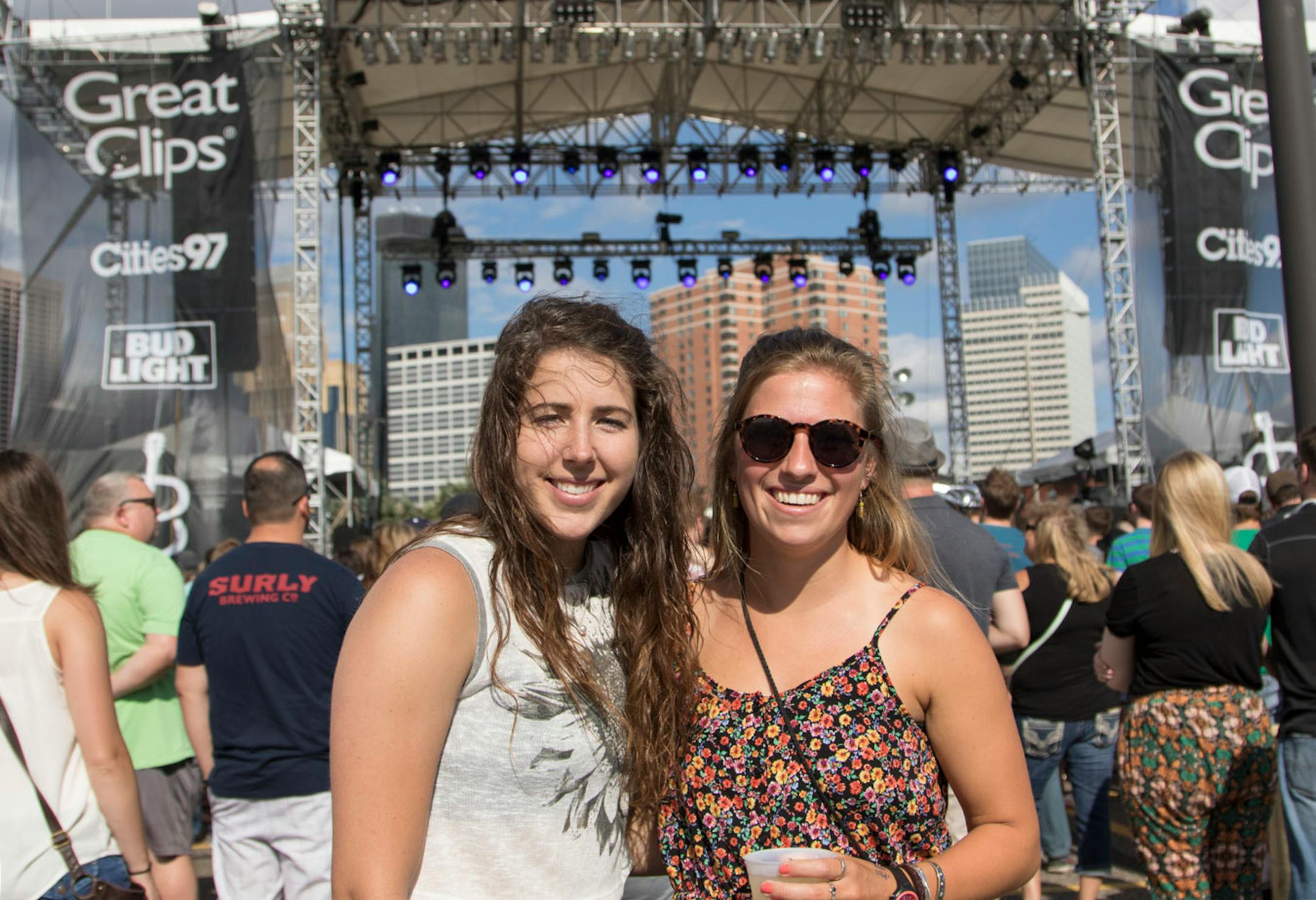 Friends gather to watch as Matt Hires performs at the Great Clips Stage on day one of the 2016 Basilica Block Party on July 8, 2016 at the Basilica in Minneapolis, Minn.