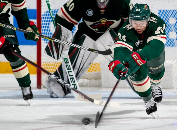 Matt Dumba stretched out for the puck in the second period Wednesday vs. Ottawa. He scored twice in the game.