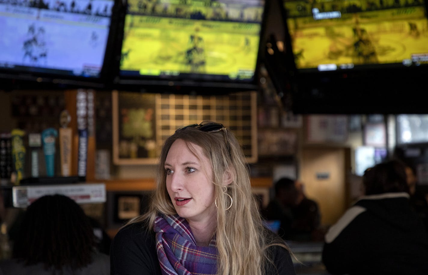 Jenna Yentsch a Wild fan and regular patron of Tom Reid's Hockey City Pub in St. Paul. ] CARLOS GONZALEZ &#x2022; cgonzalez@startribune.com &#x2013; St. Paul, MN &#x2013; March 15, 2020, There will be no fans at Xcel Energy Center on Sunday night, no people crowding the streets and the bars. The Wild game is canceled,