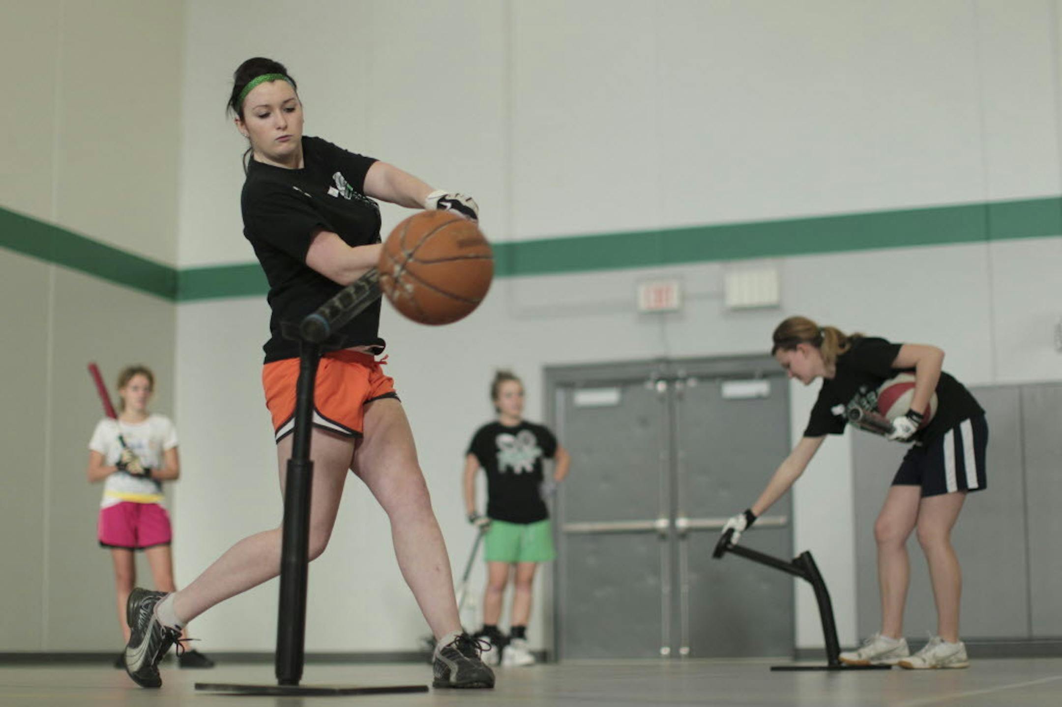 Hill-Murray slugger Stephanie Borndale, a leader on the senior-rich softball squad, participates in a drill during team tryouts on March 14.