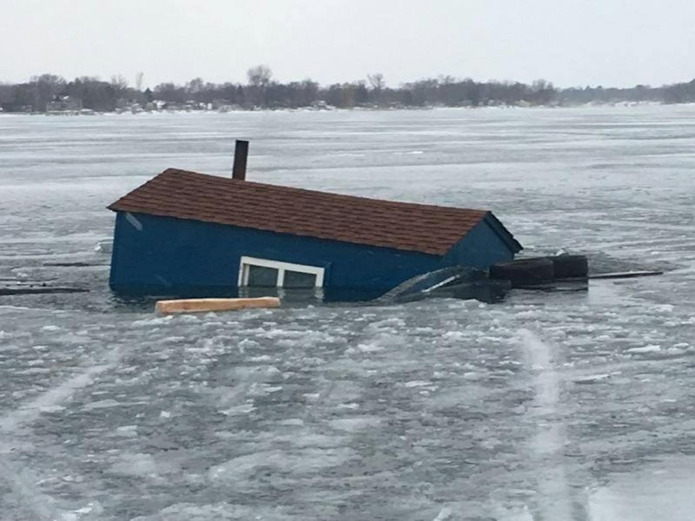 Warmer temperatures left this fish house sinking into South Lindstrom Lake, and prompted a reminder warning from the Chisago County Sheriff's Office.