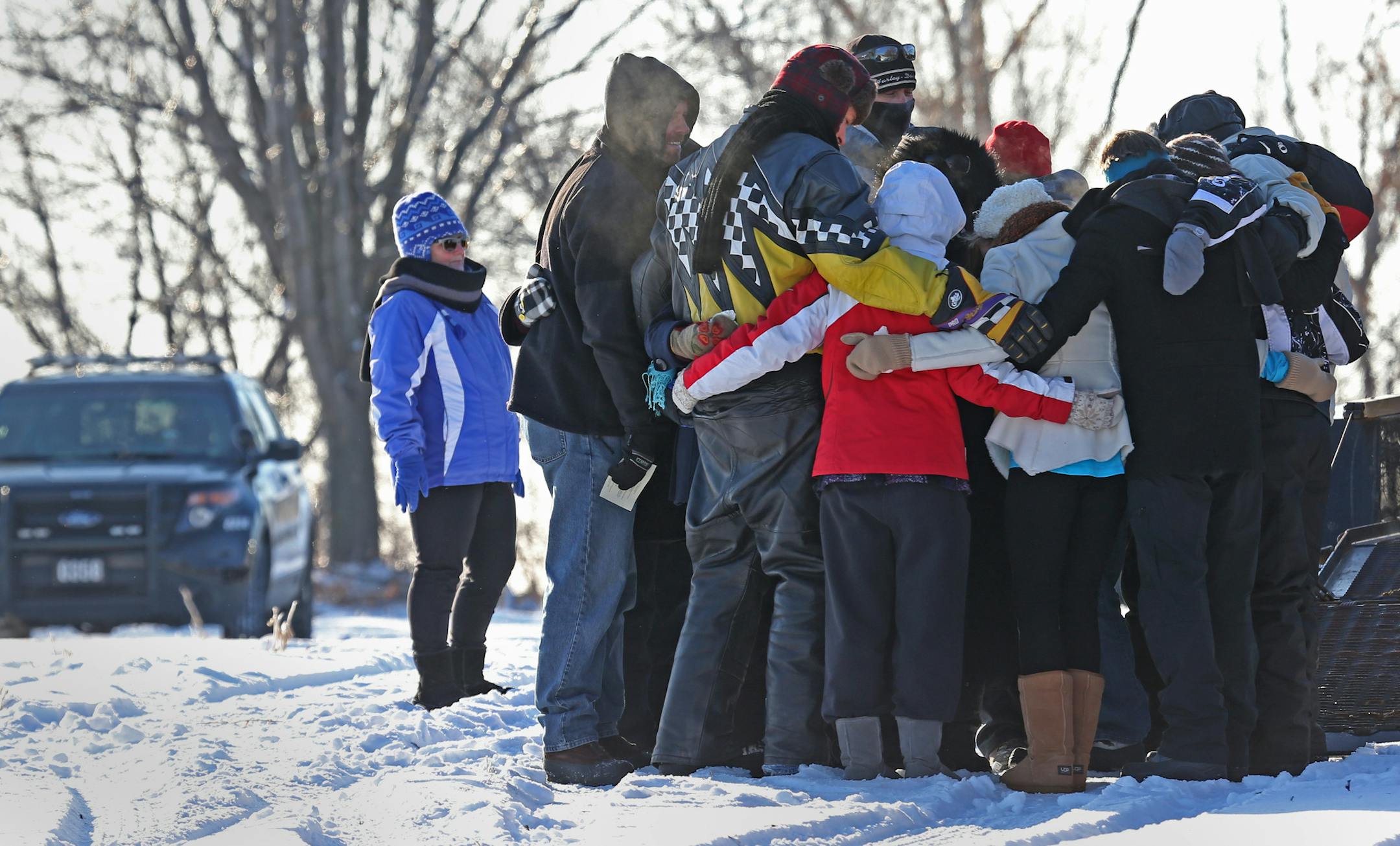 Friends and family members of Alyssa Ettl gathered near 190th St. and Dodd Blvd for a memorial for Ettl after Lakeville Police Department shut down Dodd Boulevard, on 12/7/13, to offer an opportunity for family, friends and students to visit the accident site of Alyssa Ettl. Students were transported to the accident site from the Lakeville North High School in buses. After a brief time of prayer and placement of memorials by the family of Alyssa, students had the opportunity to visit the site an