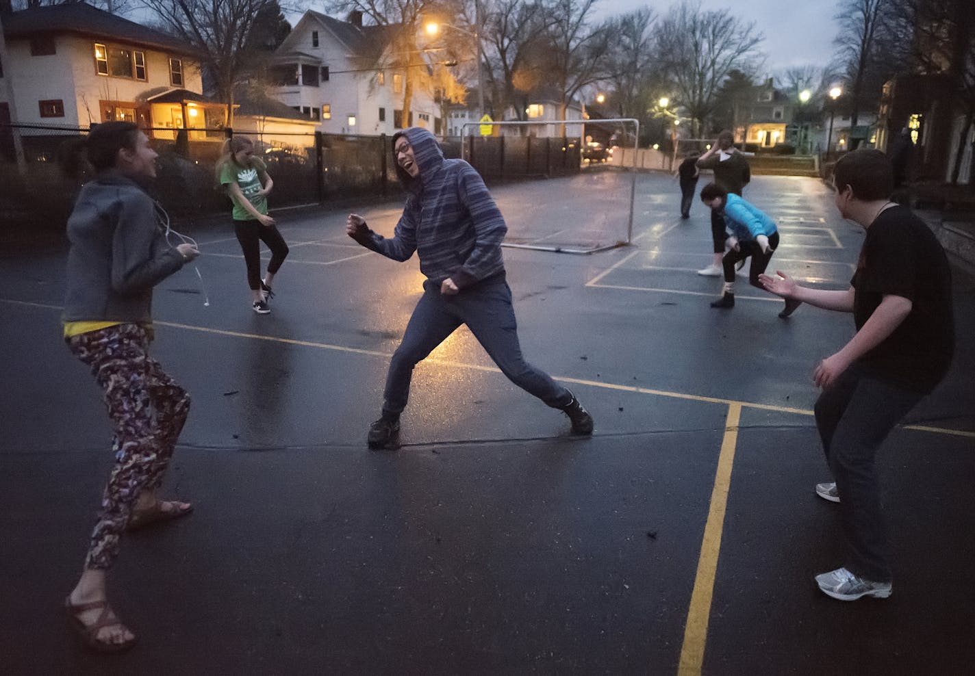 Choreographer Marcus Young, center, and members of Young Dance grooved to music of their own choosing through headphones at Barton Open School in south Minneapolis.