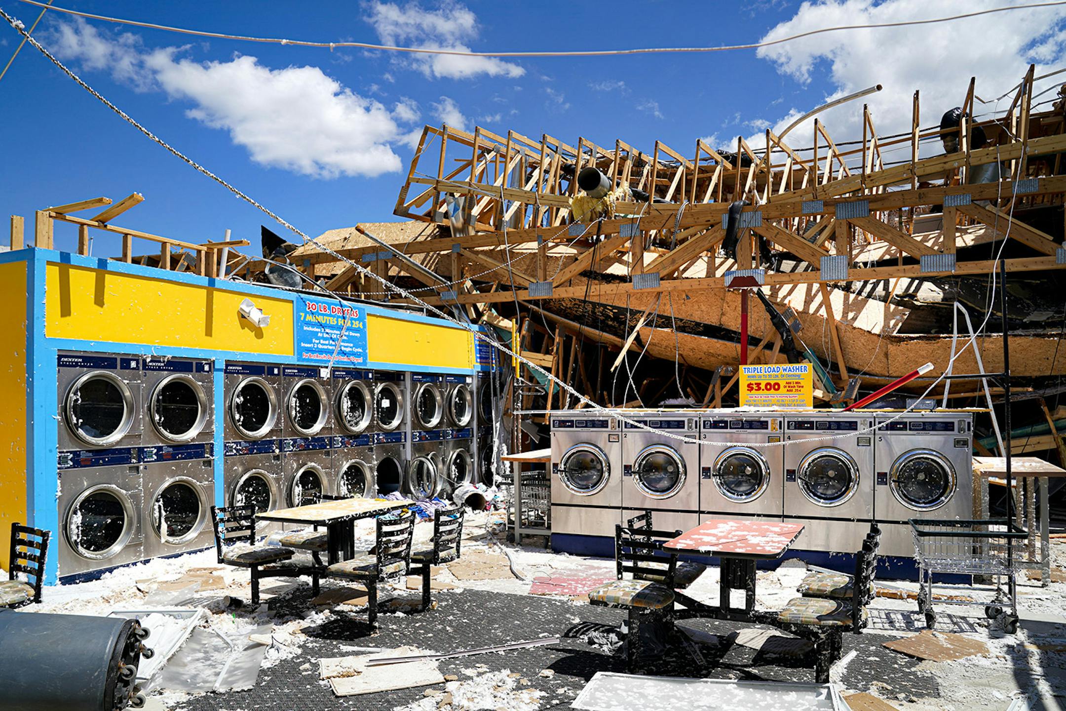 The Soapy Waters Laundromat in Cedar Rapids lost its roof during the derecho last week from winds that reached 100 miles per hour.