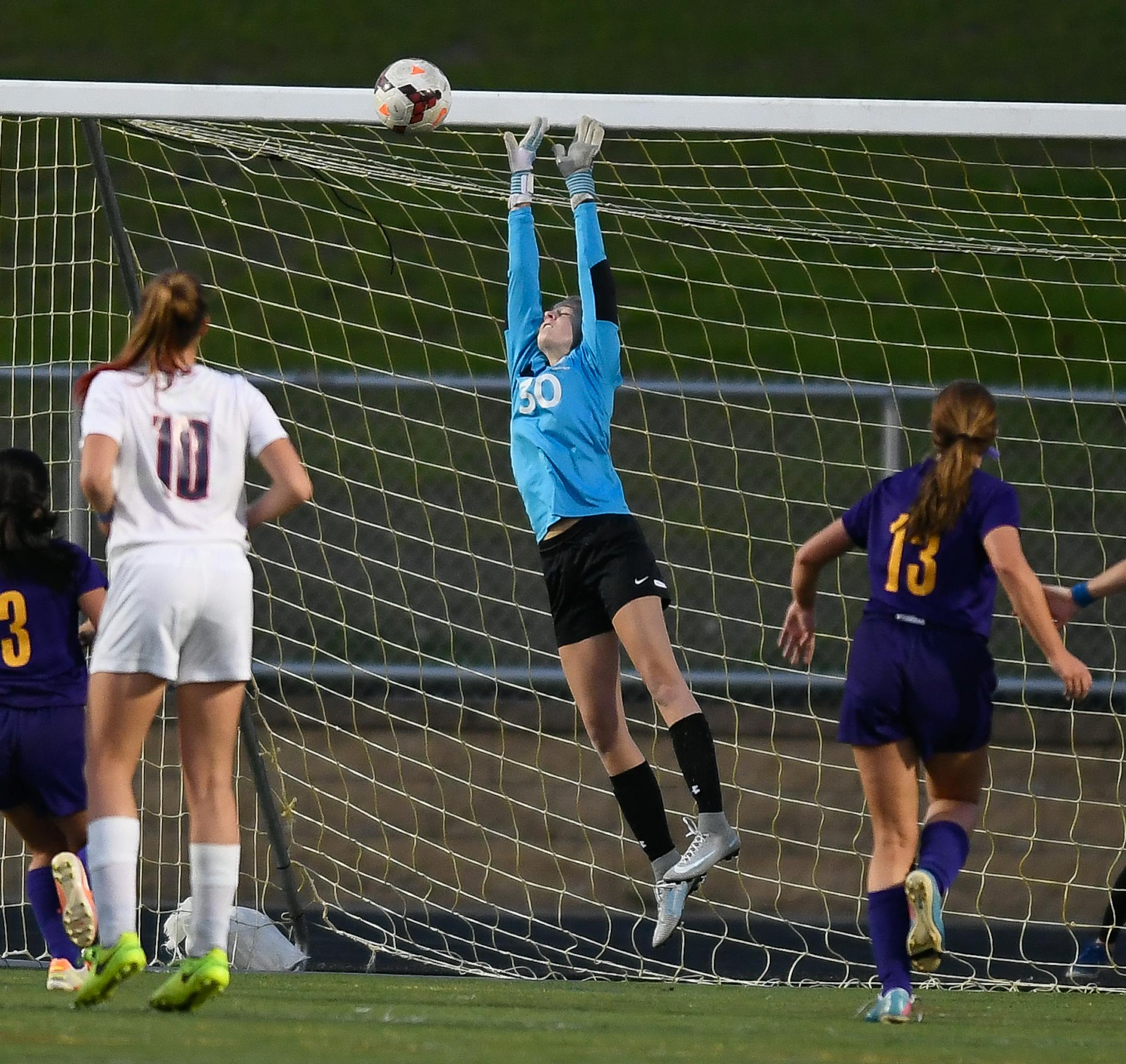 Orono goalkeeper Alexa Stoddard (30) made a save in the first half Wednesday night. ] AARON LAVINSKY ï aaron.lavinsky@startribune.com Orono played Rochester Lourdes in a 1A girls' soccer quarterfinal game on Wednesday, Oct. 25, 2017 at Farmington High School.