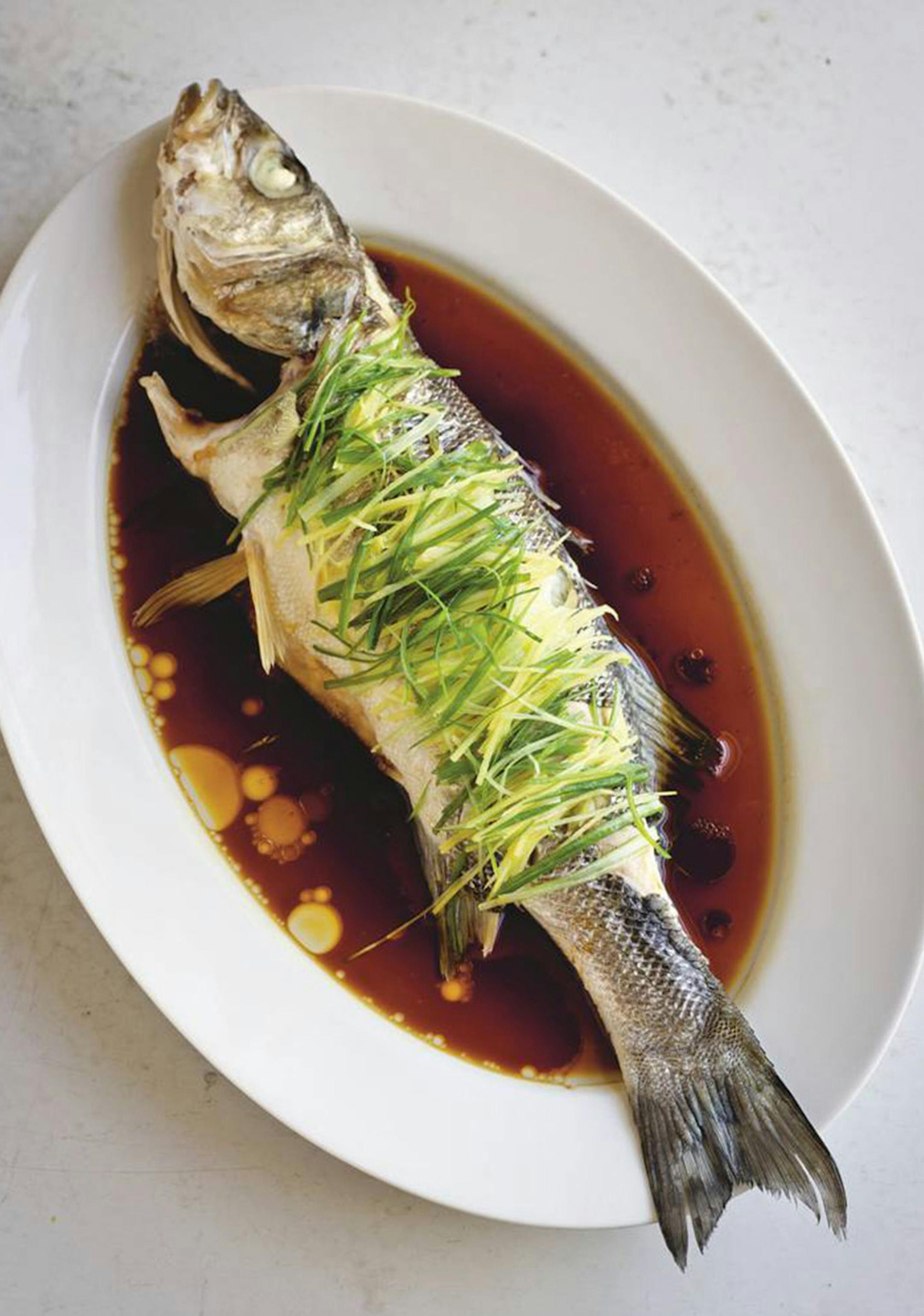 Steamed Sea Bass With ginger and spring onion from "Every Grain of Rice" by Fuschia Dunlap.