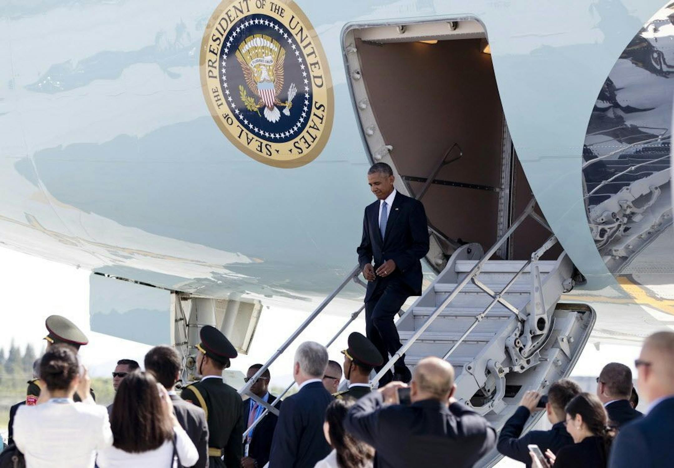 U.S. President Barack Obama arrives on Air Force One at Hangzhou Xiaoshan International Airport in Hangzhou in eastern China's Zhejiang province, Saturday, Sept. 3, 2016. He had to exit the plane from a lower door when no staircase was provided by airport authorities.