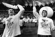 Tom Brunansky and Kent Hrbek waved to fans during the hastily planned Metrodome celebration after the Twins defeated Detroit to win the 1987 American 