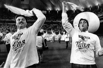 Tom Brunansky and Kent Hrbek waved to fans during the hastily planned Metrodome celebration after the Twins defeated Detroit to win the 1987 American 