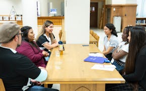 Students and journalist mentors interview sources on ThreeSixty Journalism News Reporter Academy sourcing day in the O'Shaughnessy-Frey Library on Jun