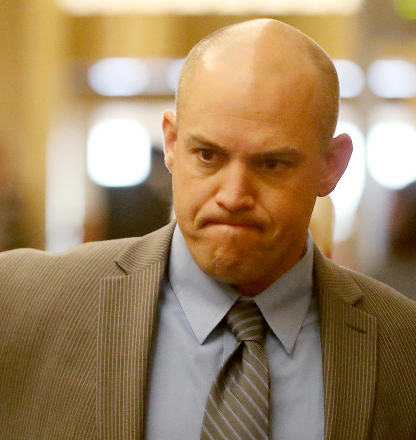 St. Paul police officer Michael Soucheray II for opening statements and testimony at the Ramsey County Courthouse Tuesday, May 2, 2017, in St. Paul, MN. Soucheray is charged with punching a suicidal 14-year-old girl outside of a shelter for sexually exploited girls. The girl spat in Soucheray's face before he allegedly struck the girl in the face twice with a closed fist.] DAVID JOLES &#xef; david.joles@startribune.com Opening statements and testimony will being Tuesday in the trial of St. Paul