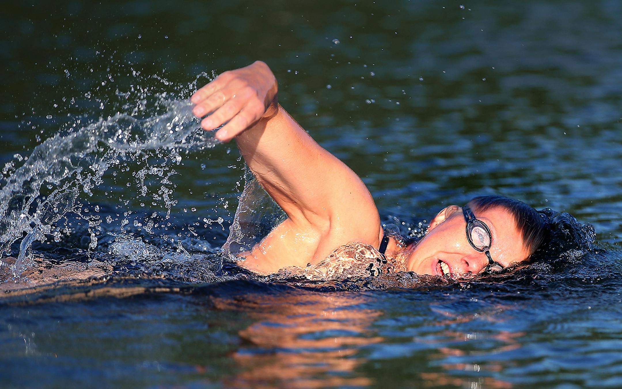 Endurance swimmer Karen Zemlin, who is training for her attempt at swimming the English Channel in August, took in an early swim at Lake Minnetonka, Tuesday, July 7, 2015 in Wayzata, MN. ] (ELIZABETH FLORES/STAR TRIBUNE) ELIZABETH FLORES ï eflores@startribune.com ORG XMIT: MIN1507070939200094